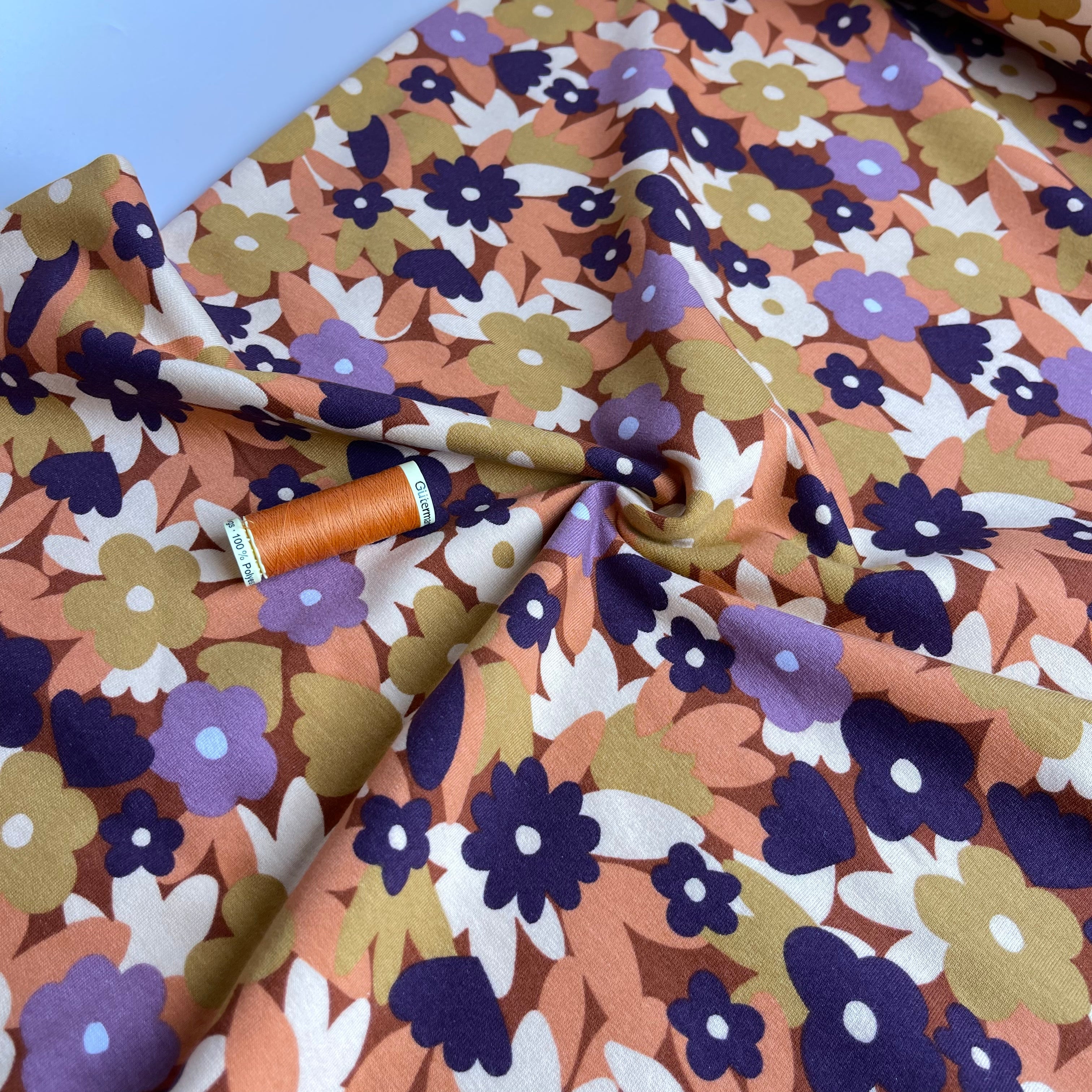Graphic Meadow on Rust Peach Soft Cotton Sweat-shirting Fabric