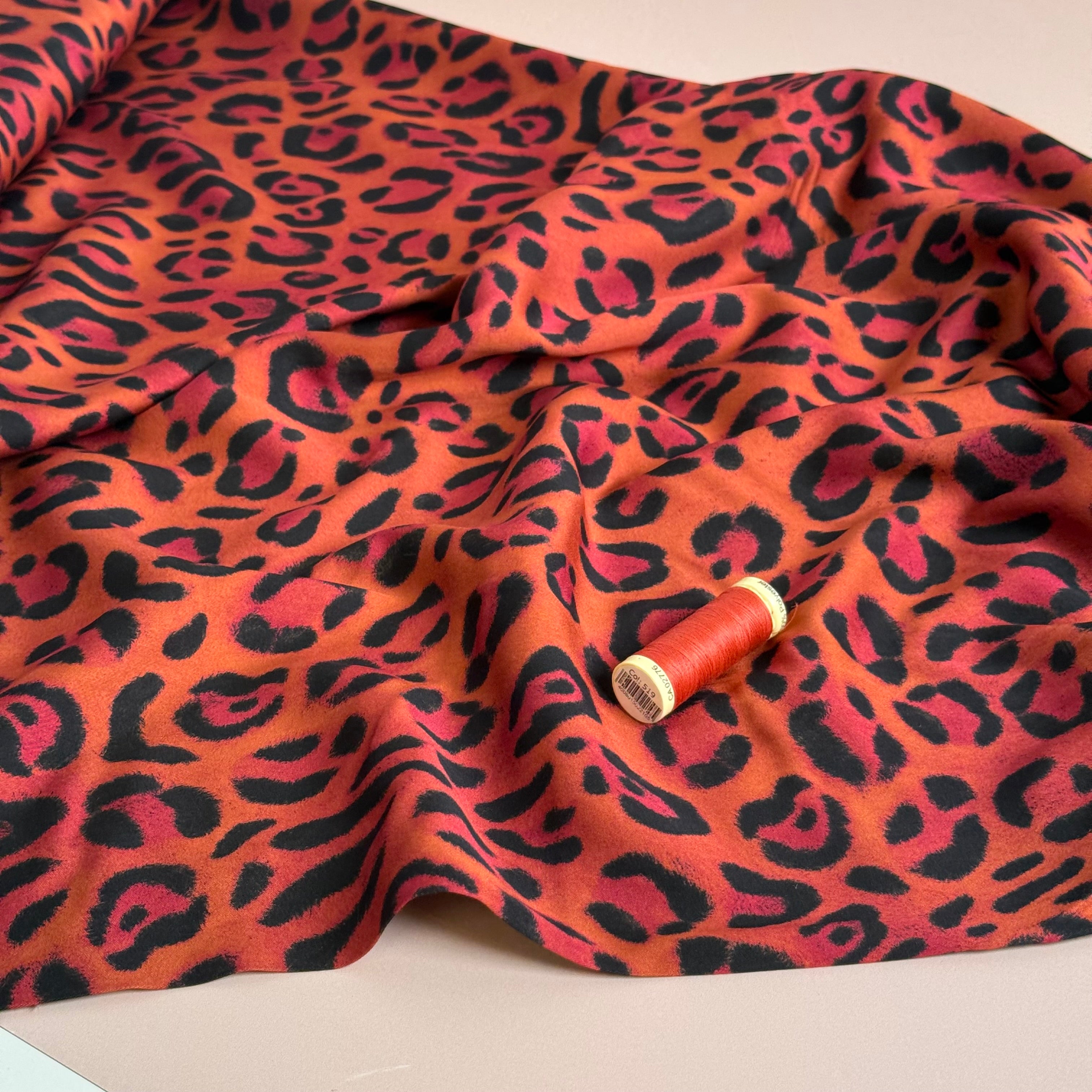 Animal Print Orange Viscose Sateen Fabric