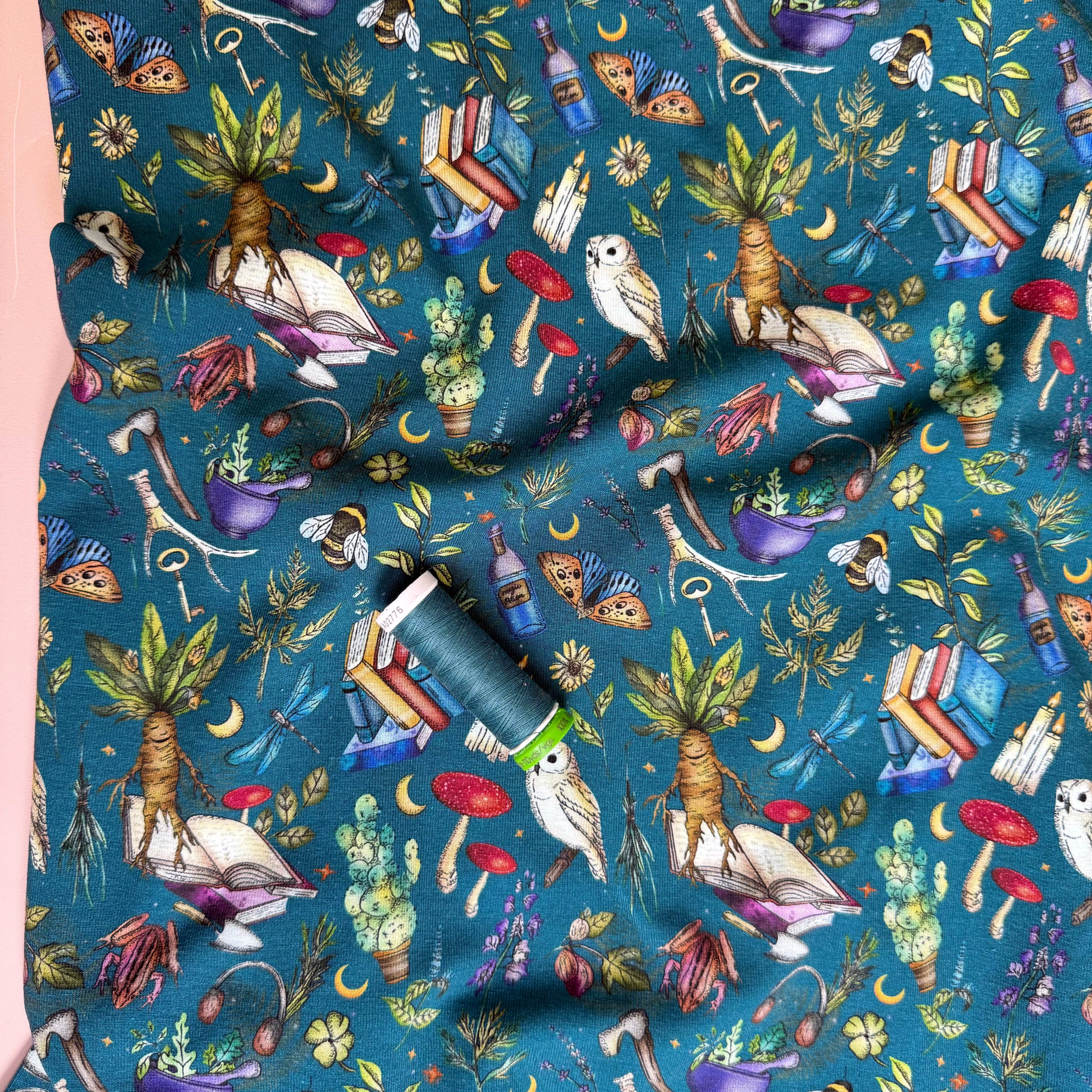 Magical Symbols Teal Cotton Jersey Fabric