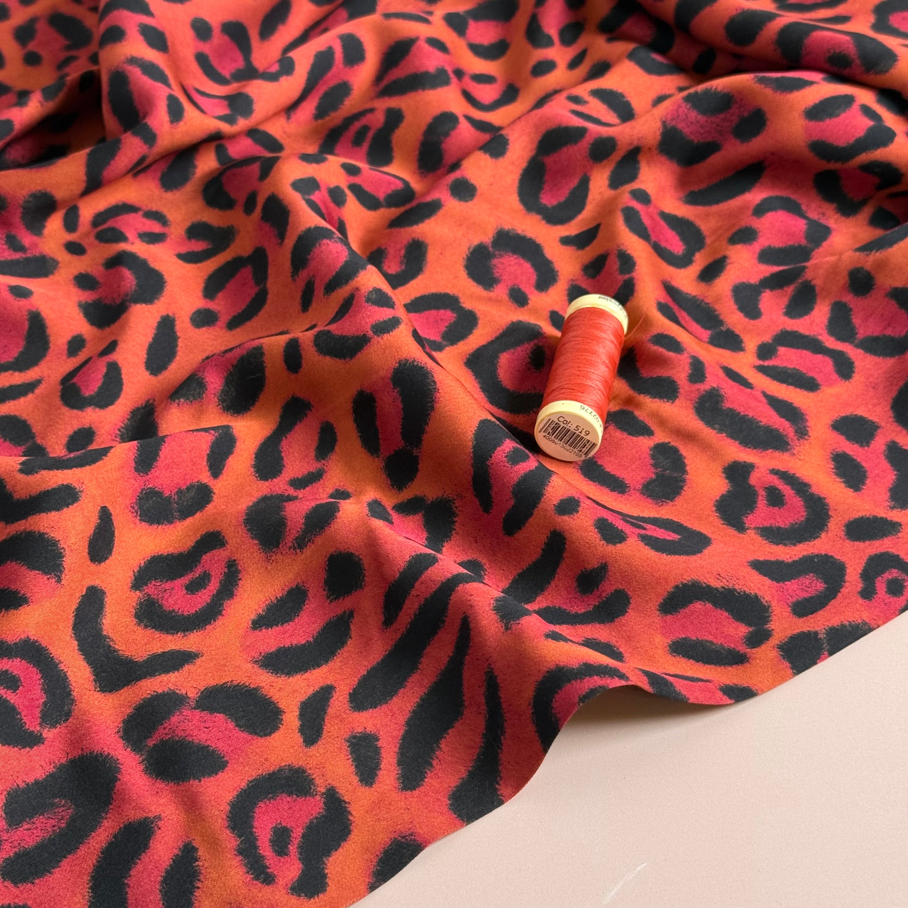 Animal Print Orange Viscose Sateen Fabric