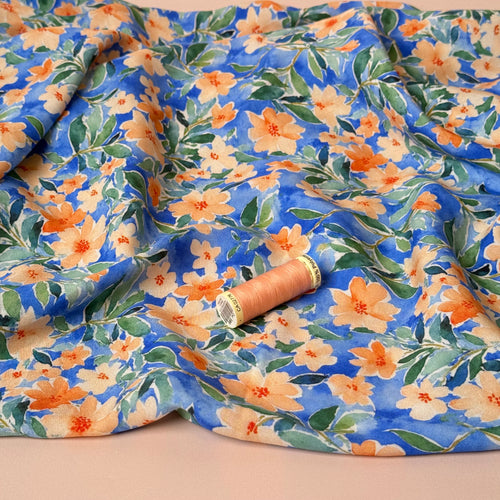 Peach Watercolour Flowers on Blue Viscose Fabric