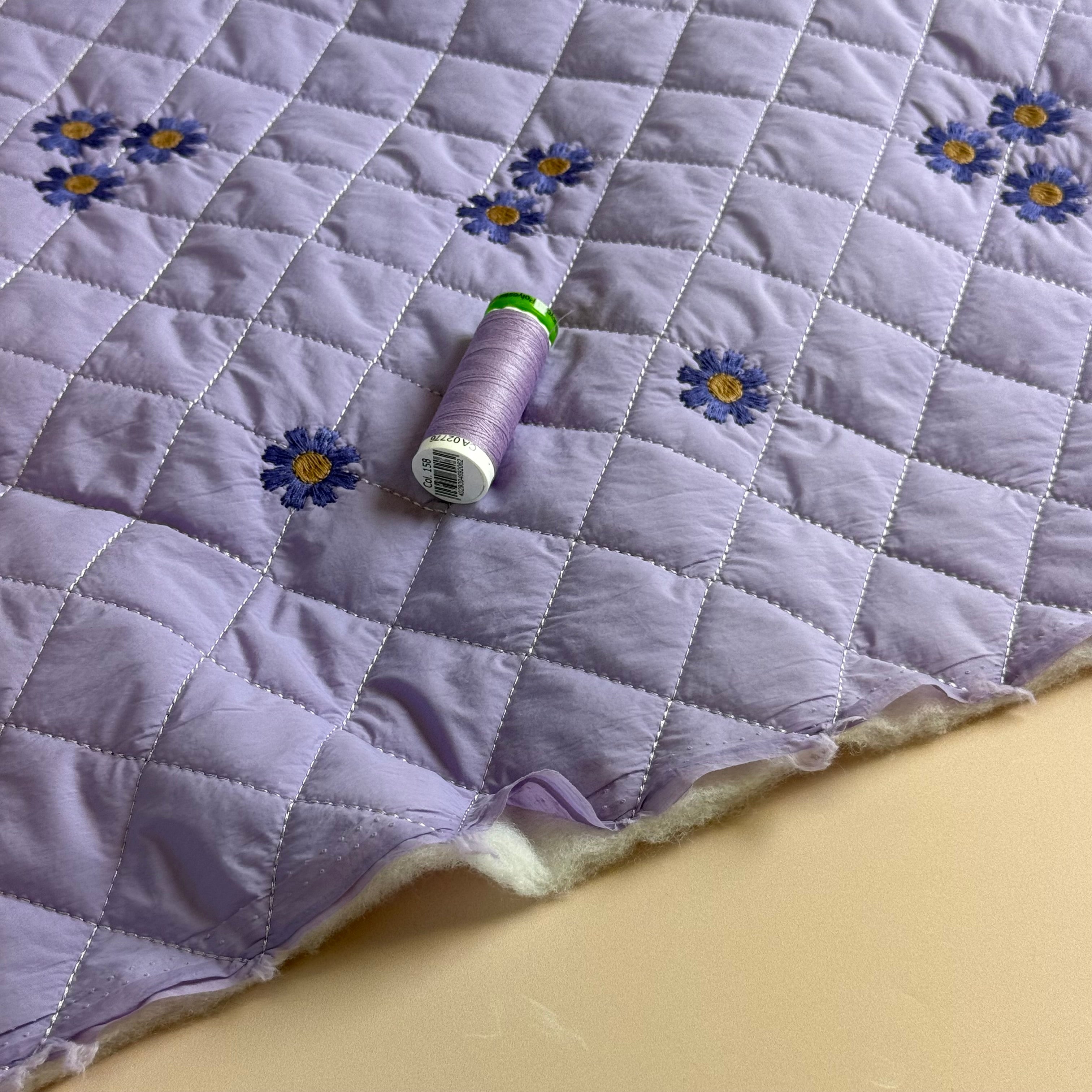 Embroidered Flowers on Lilac Quilted Fabric