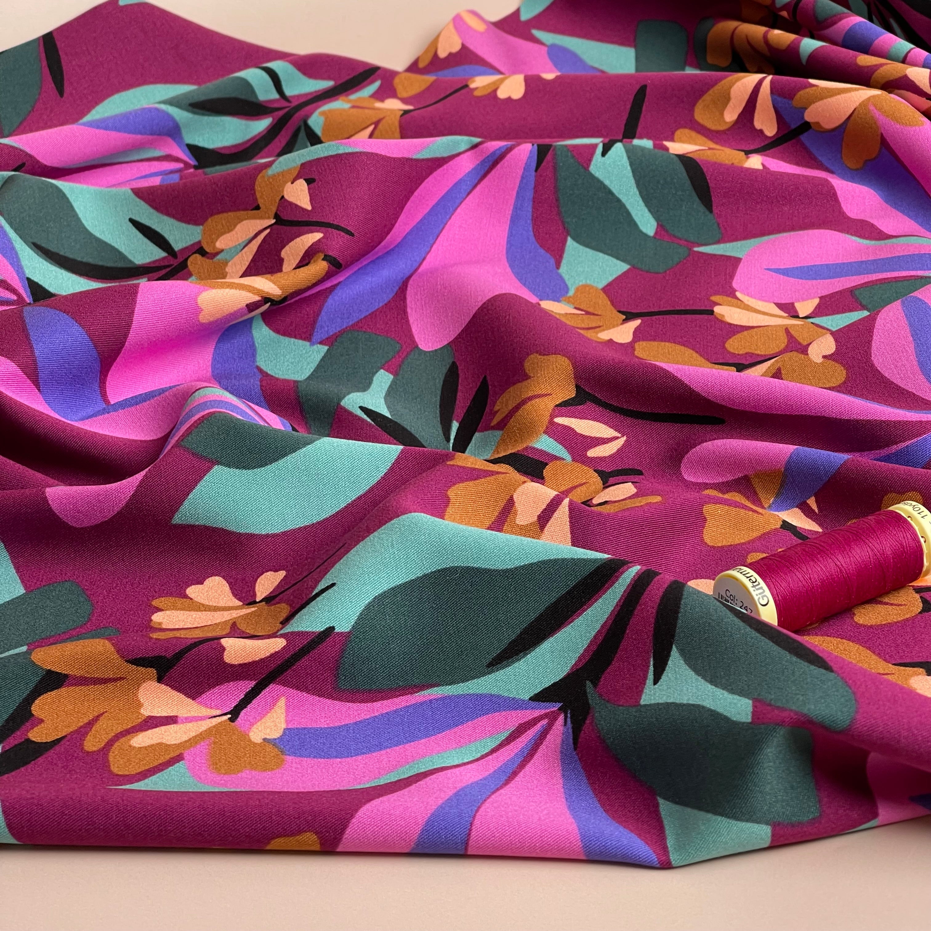 Nerida Hansen - Rosella Spring Garden on Plum Stretch Viscose Twill Fabric