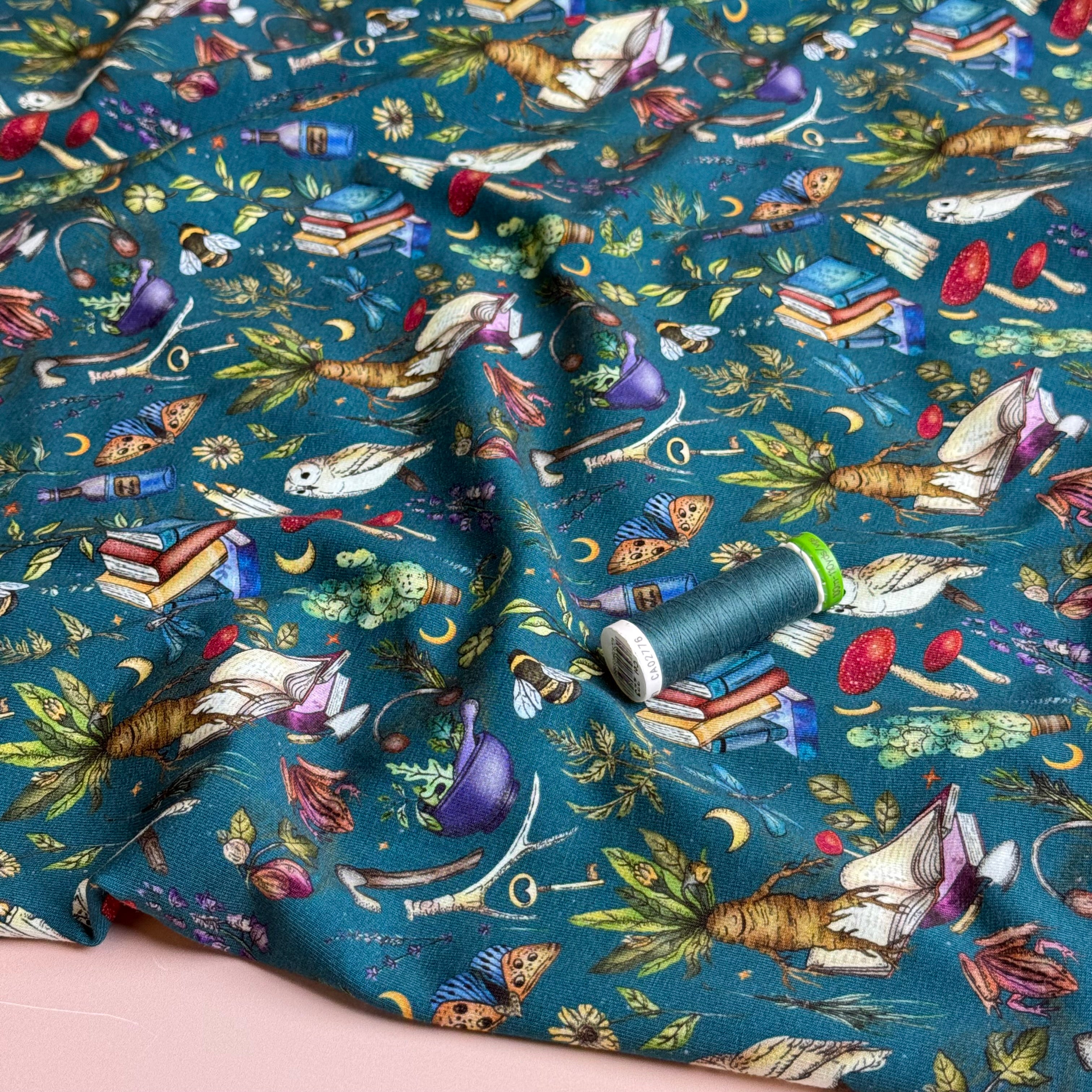 Magical Symbols Teal Cotton Jersey Fabric