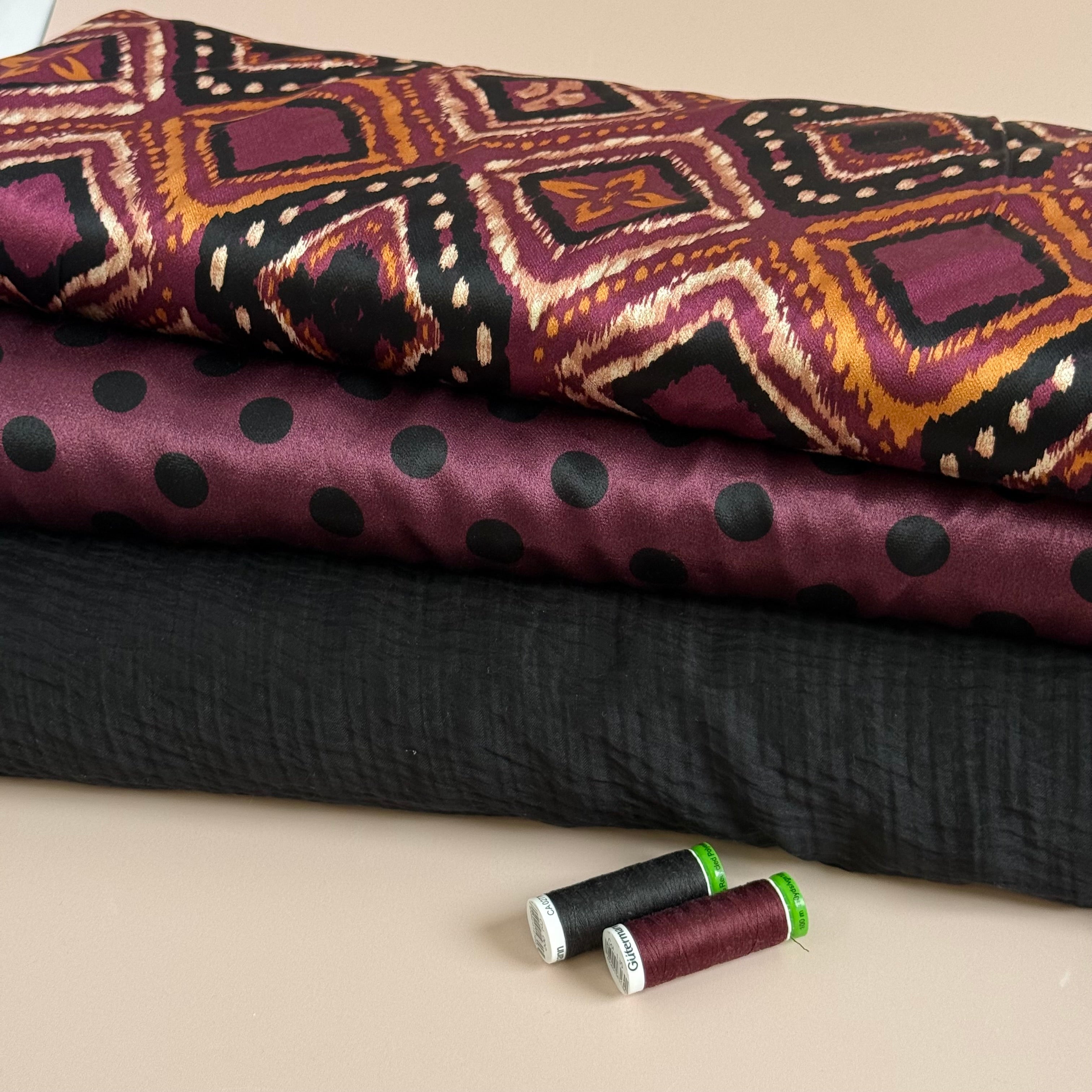 Polka Black on Wine Spun Viscose Sateen Fabric
