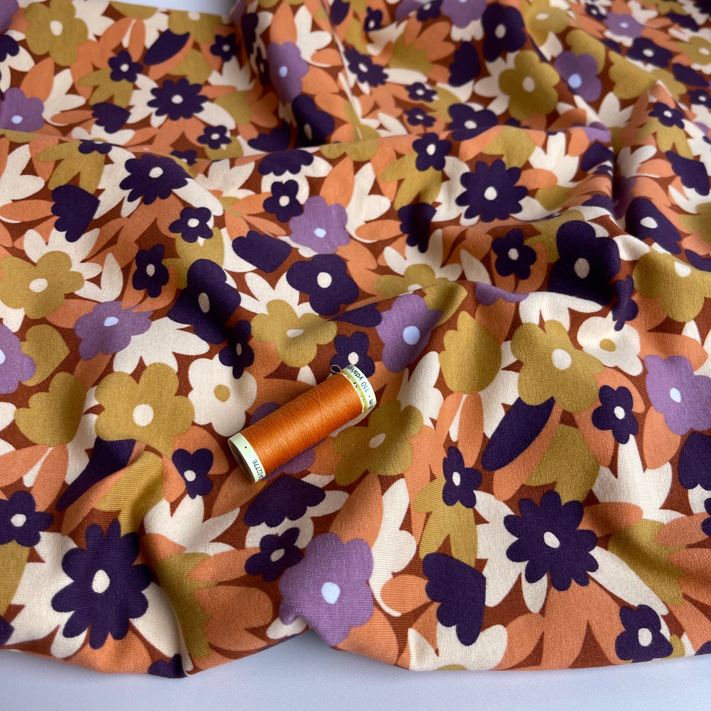 Graphic Meadow on Rust Peach Soft Cotton Sweat-shirting Fabric