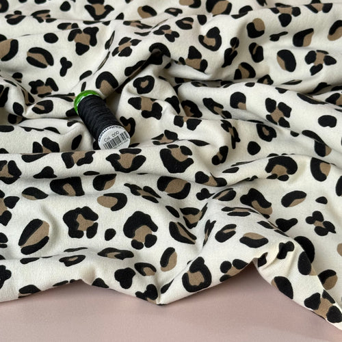 Animal Print on Off-White Peach Soft Cotton Sweat-shirting Fabric
