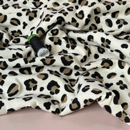 Animal Print on Off-White Peach Soft Cotton Sweat-shirting Fabric