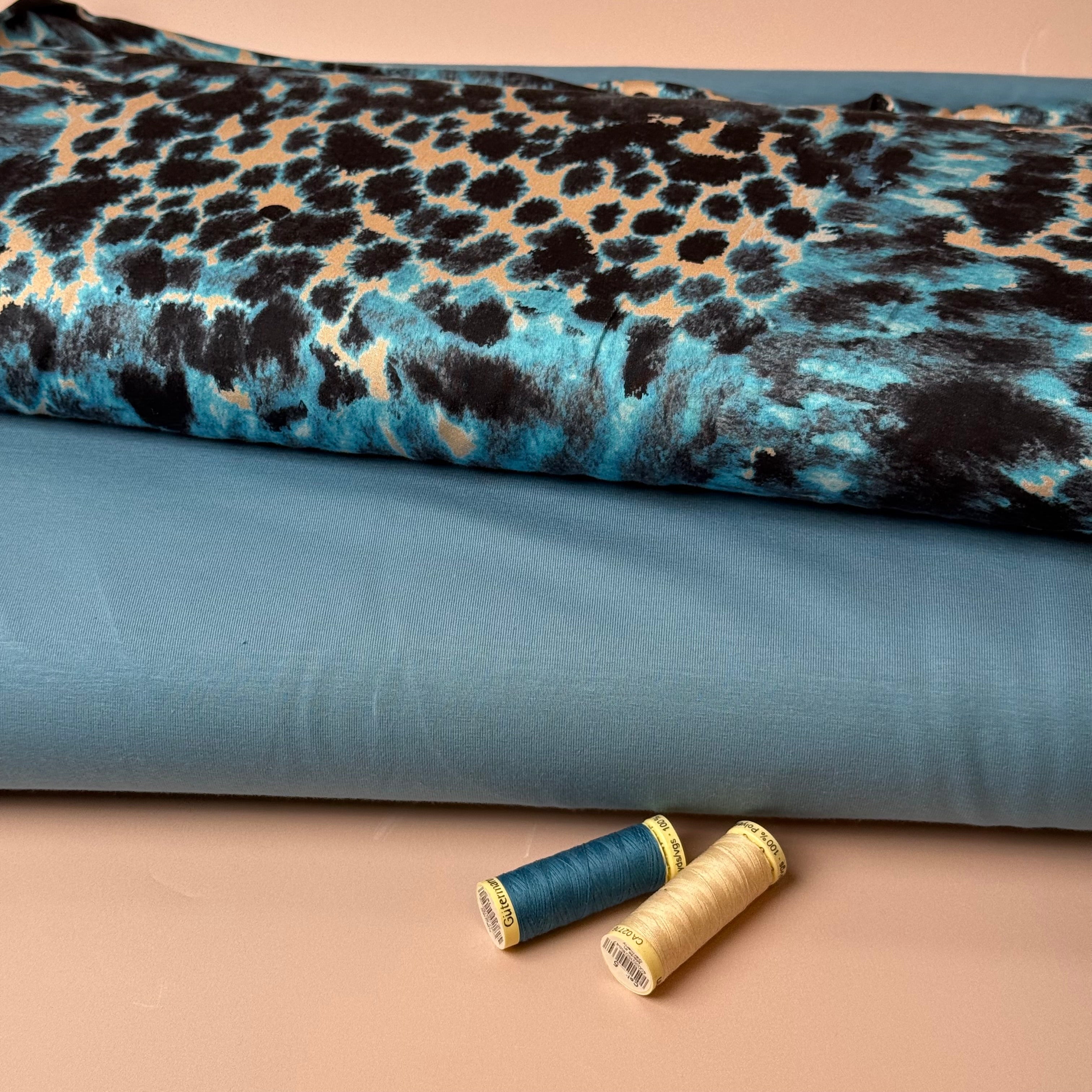 Turquoise Animal Print Viscose Sateen Fabric
