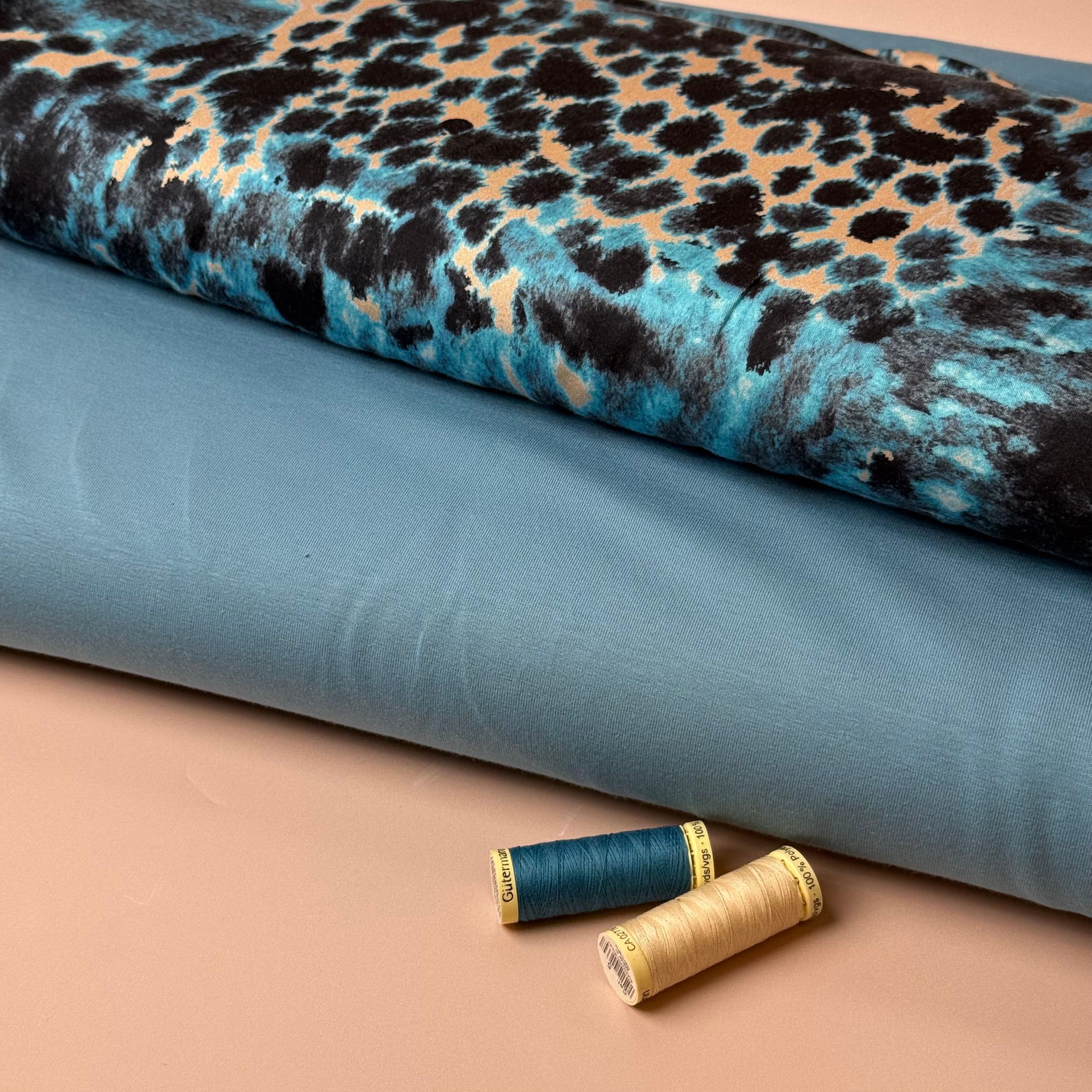 Turquoise Animal Print Viscose Sateen Fabric