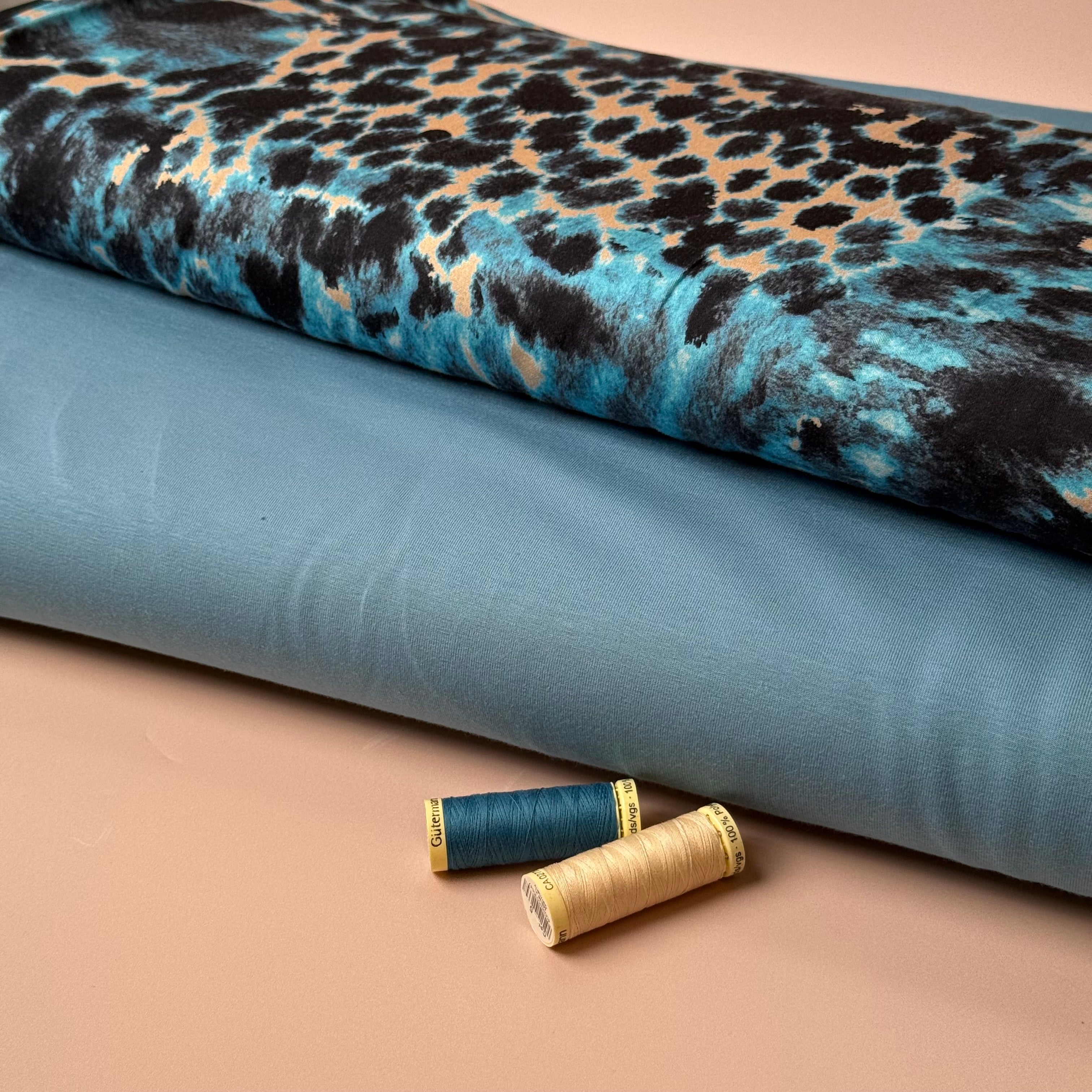 Turquoise Animal Print Viscose Sateen Fabric