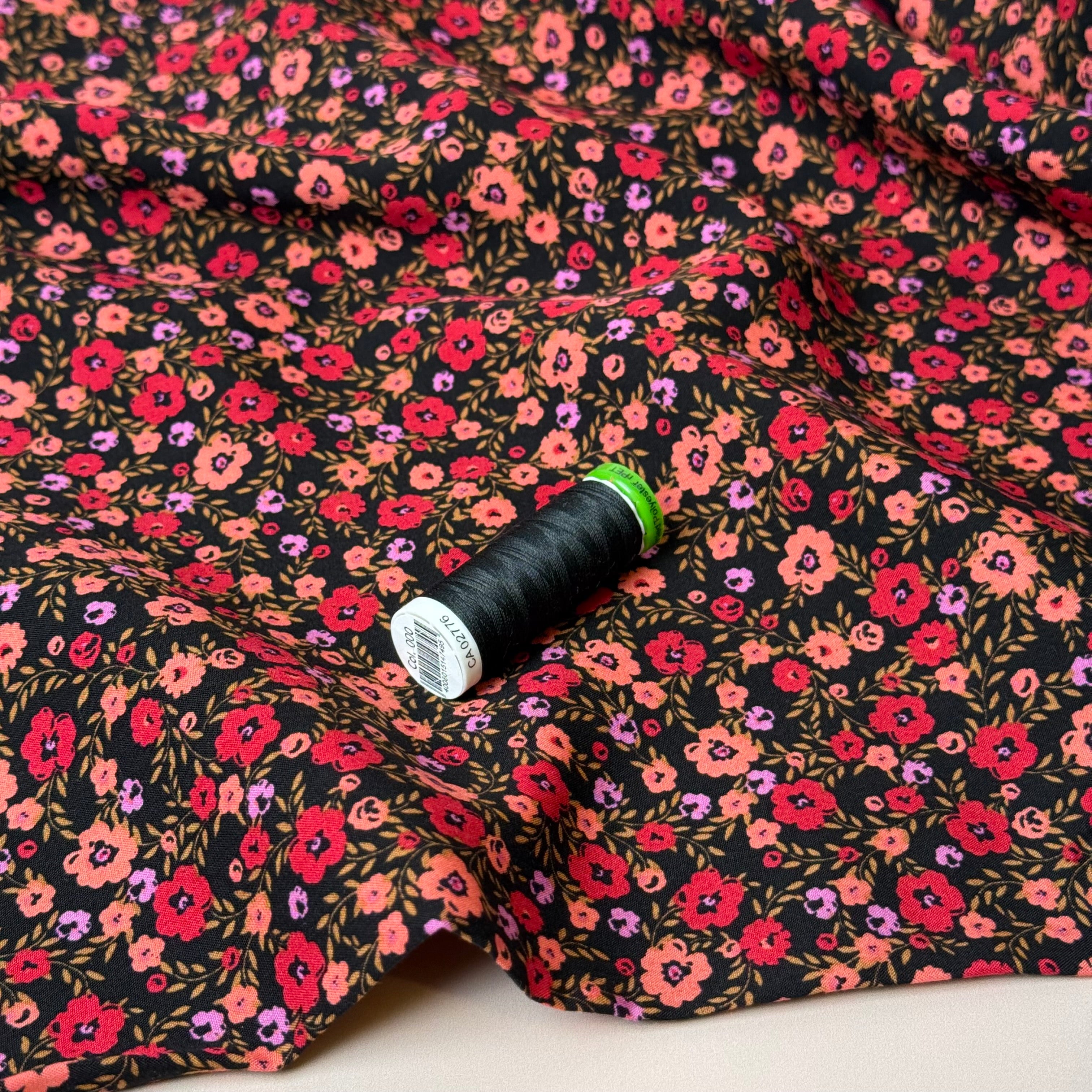 Ditsy Flowers on Black Viscose Fabric