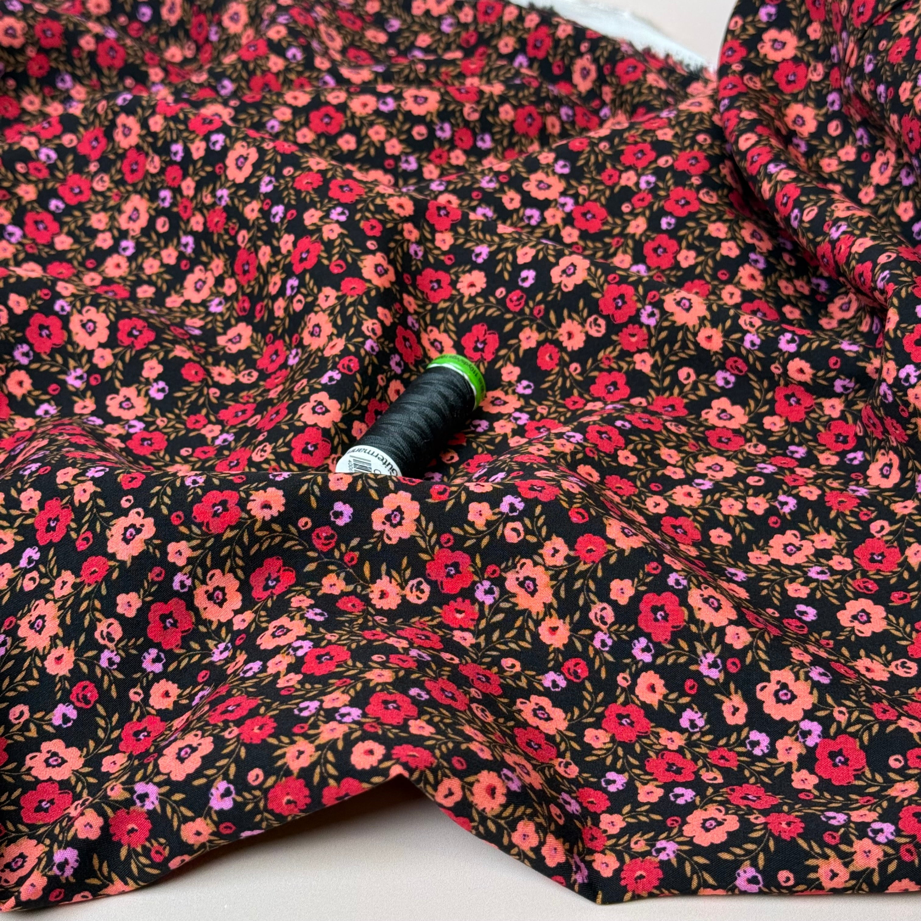 Ditsy Flowers on Black Viscose Fabric