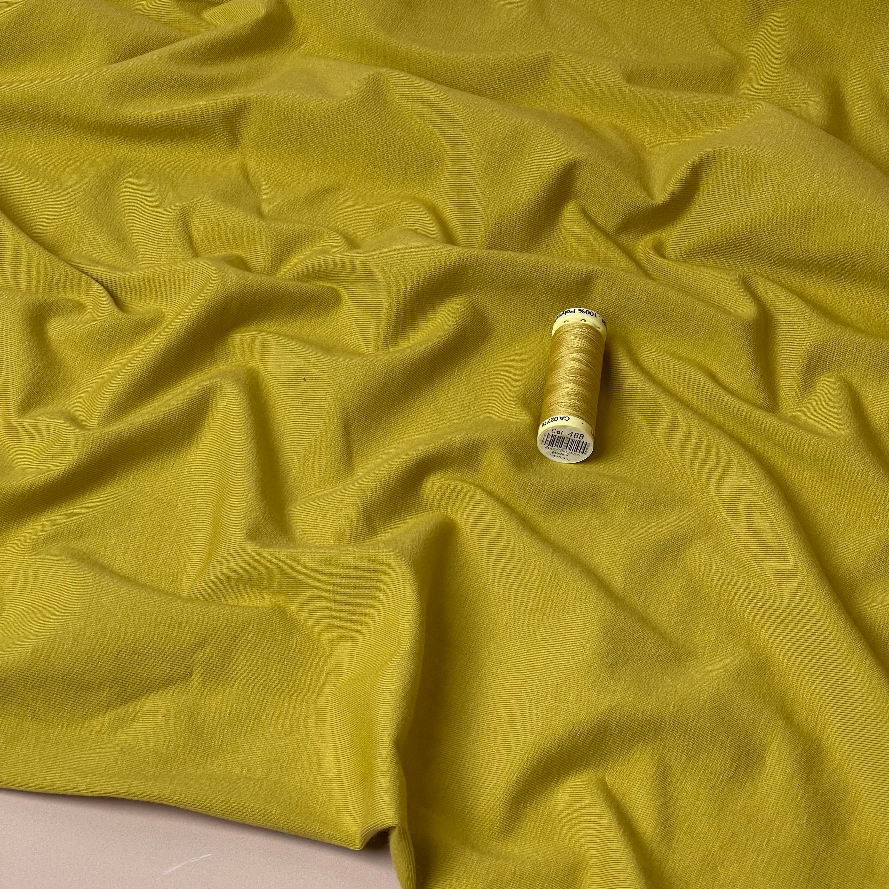 Essential Chic Celery Plain Cotton Jersey Fabric