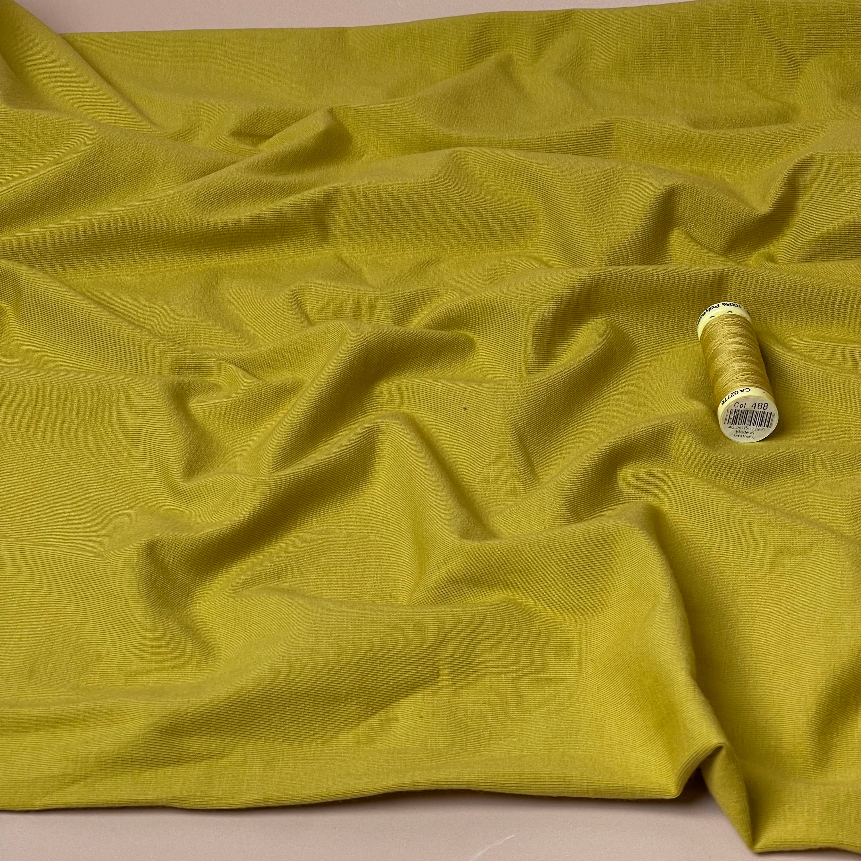 Essential Chic Celery Plain Cotton Jersey Fabric