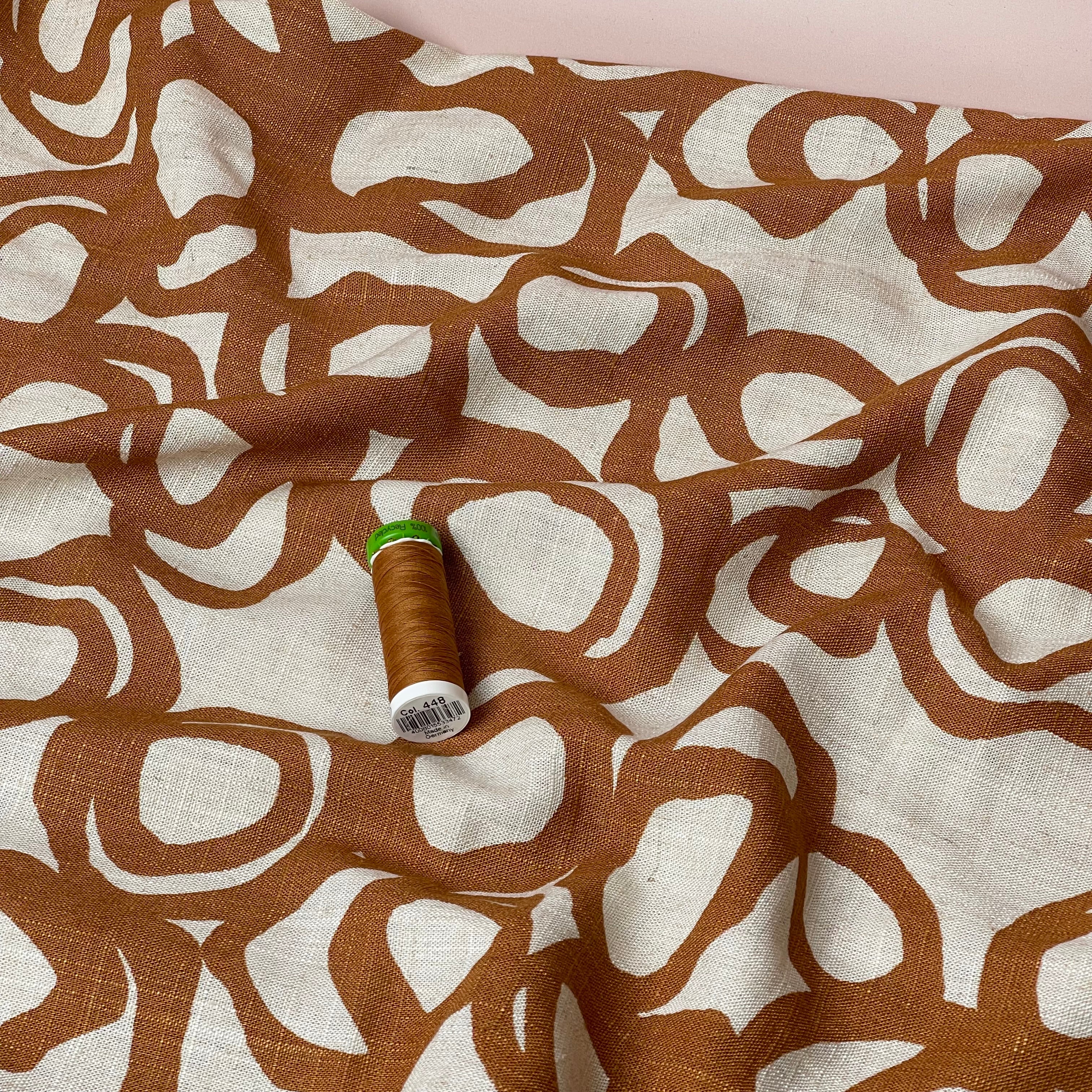 Swirls Rust on Neutral Viscose Linen Fabric