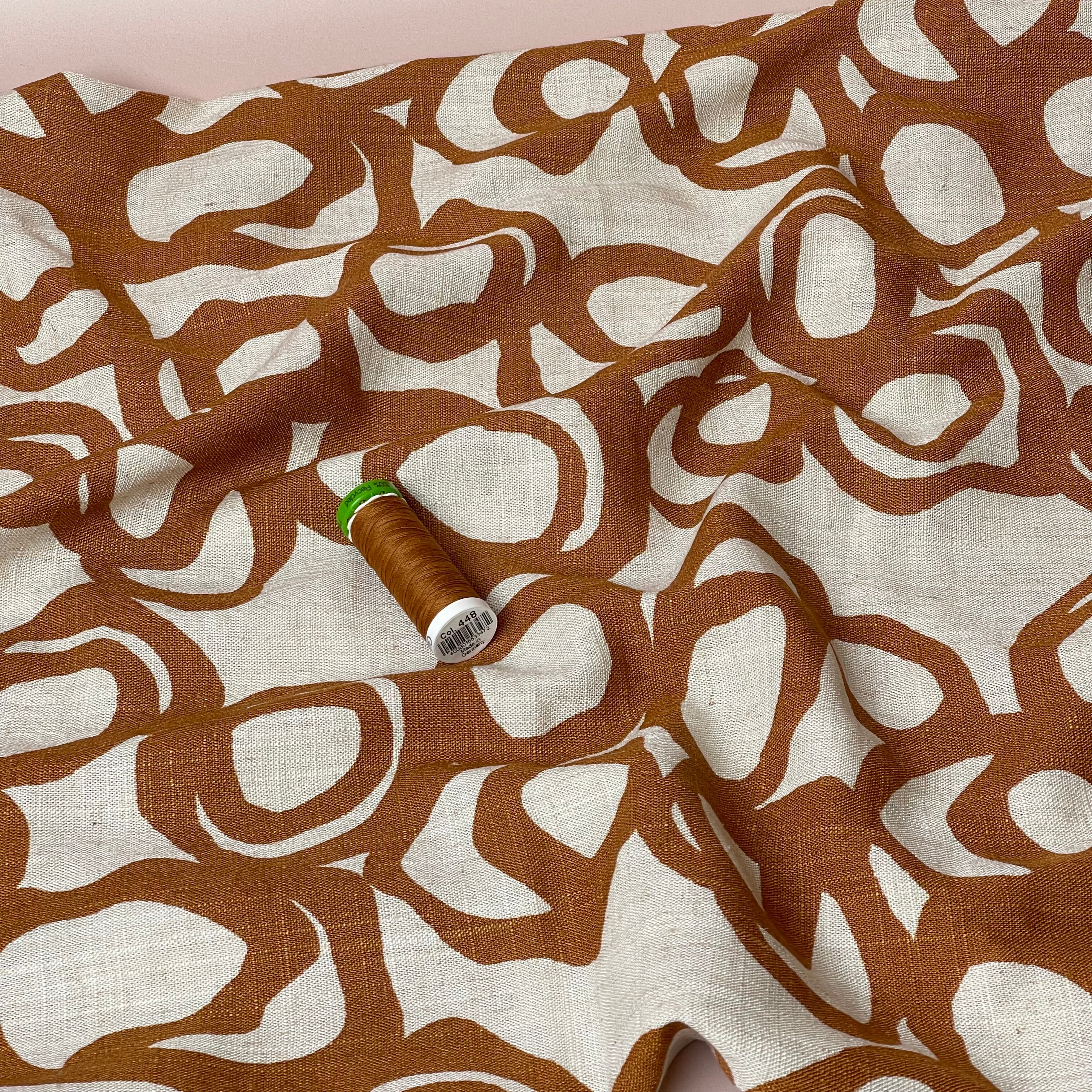 Swirls Rust on Neutral Viscose Linen Fabric