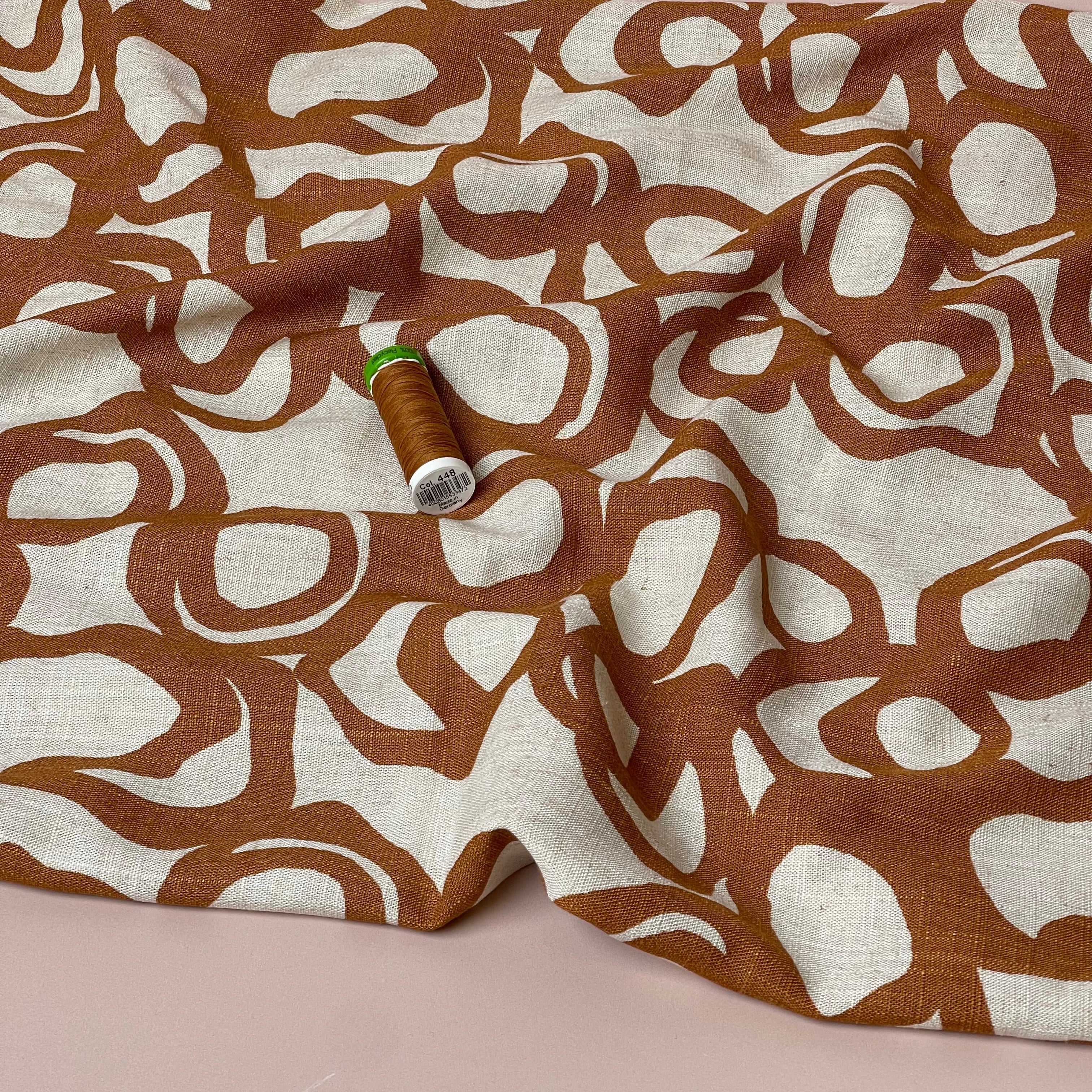 Swirls Rust on Neutral Viscose Linen Fabric