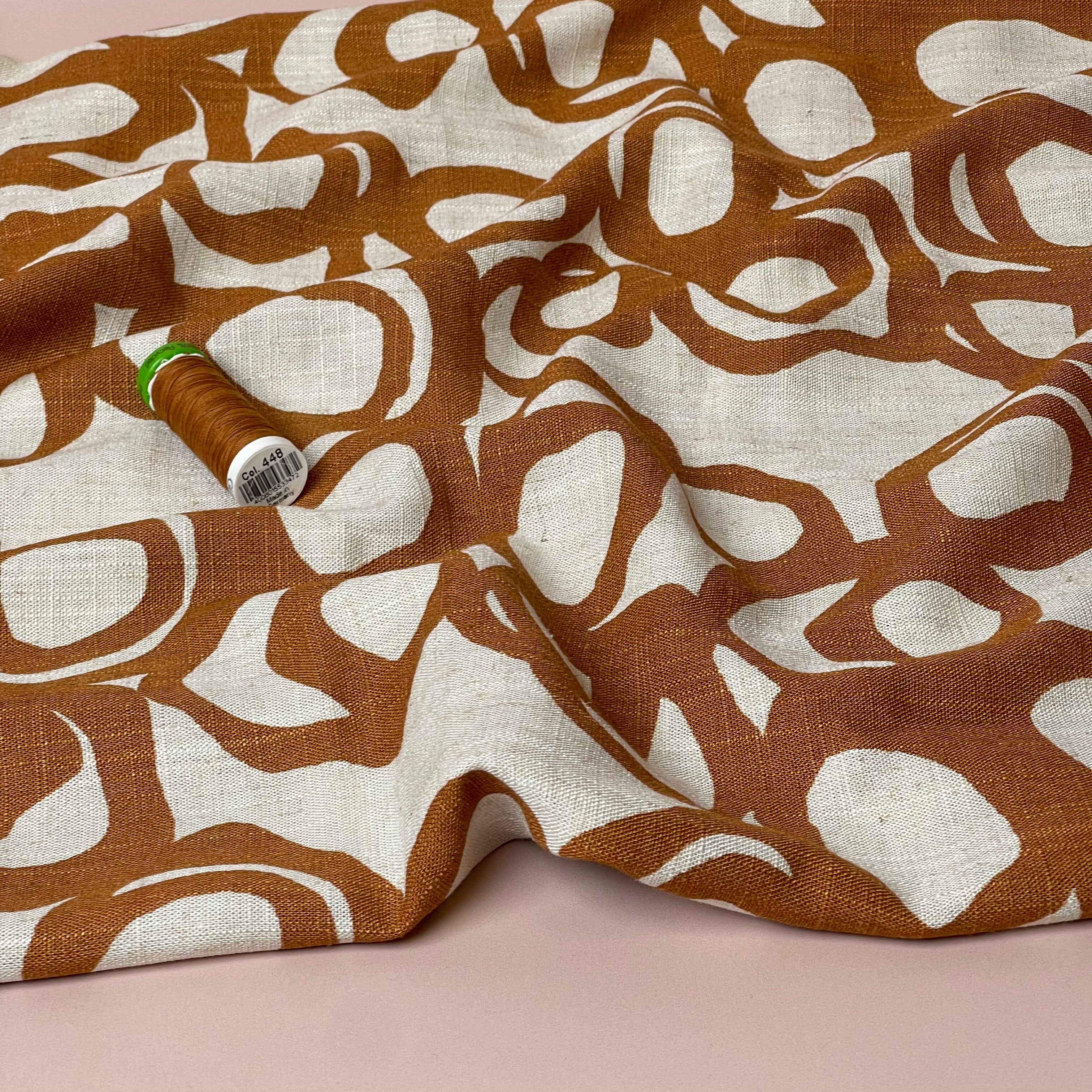 Swirls Rust on Neutral Viscose Linen Fabric