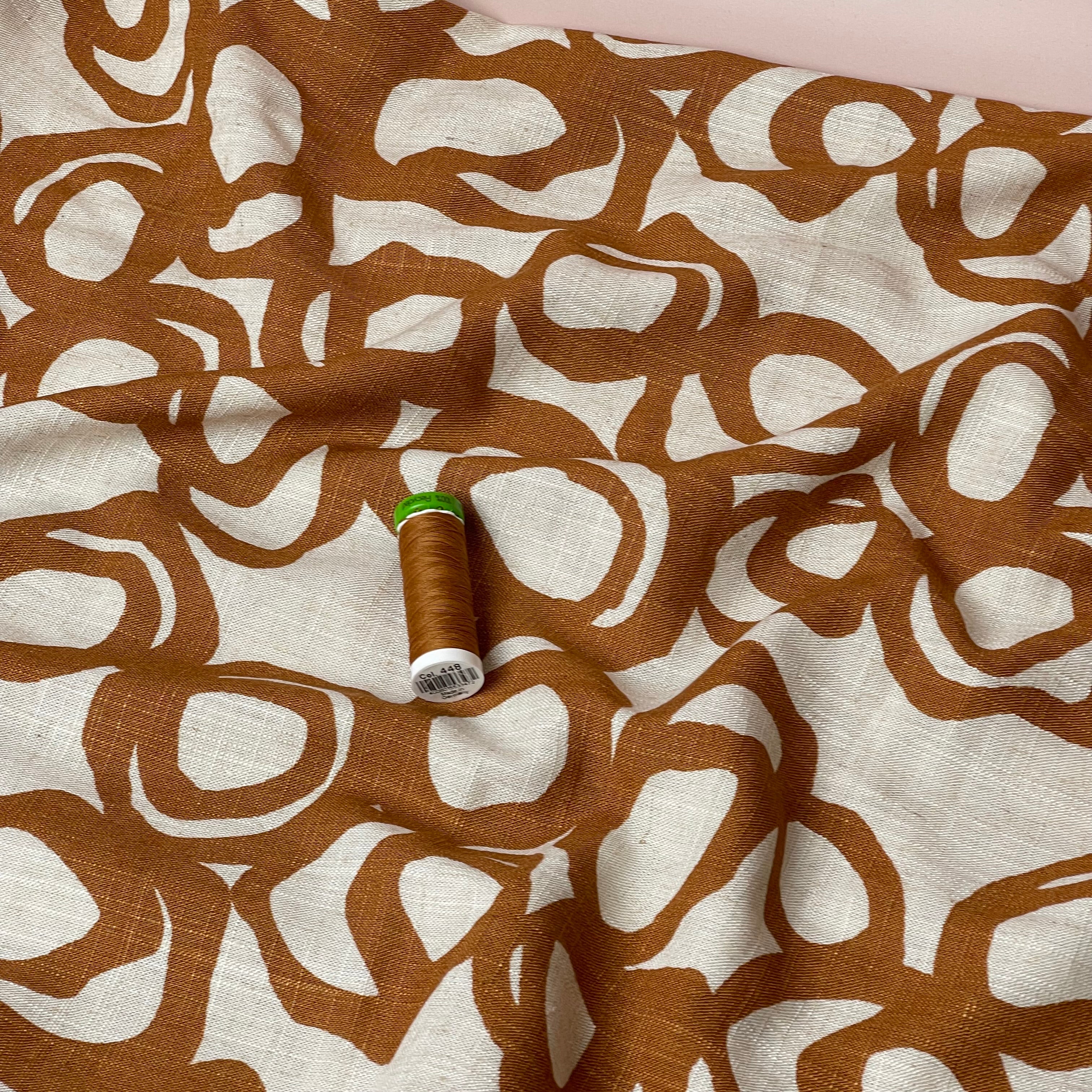 Swirls Rust on Neutral Viscose Linen Fabric
