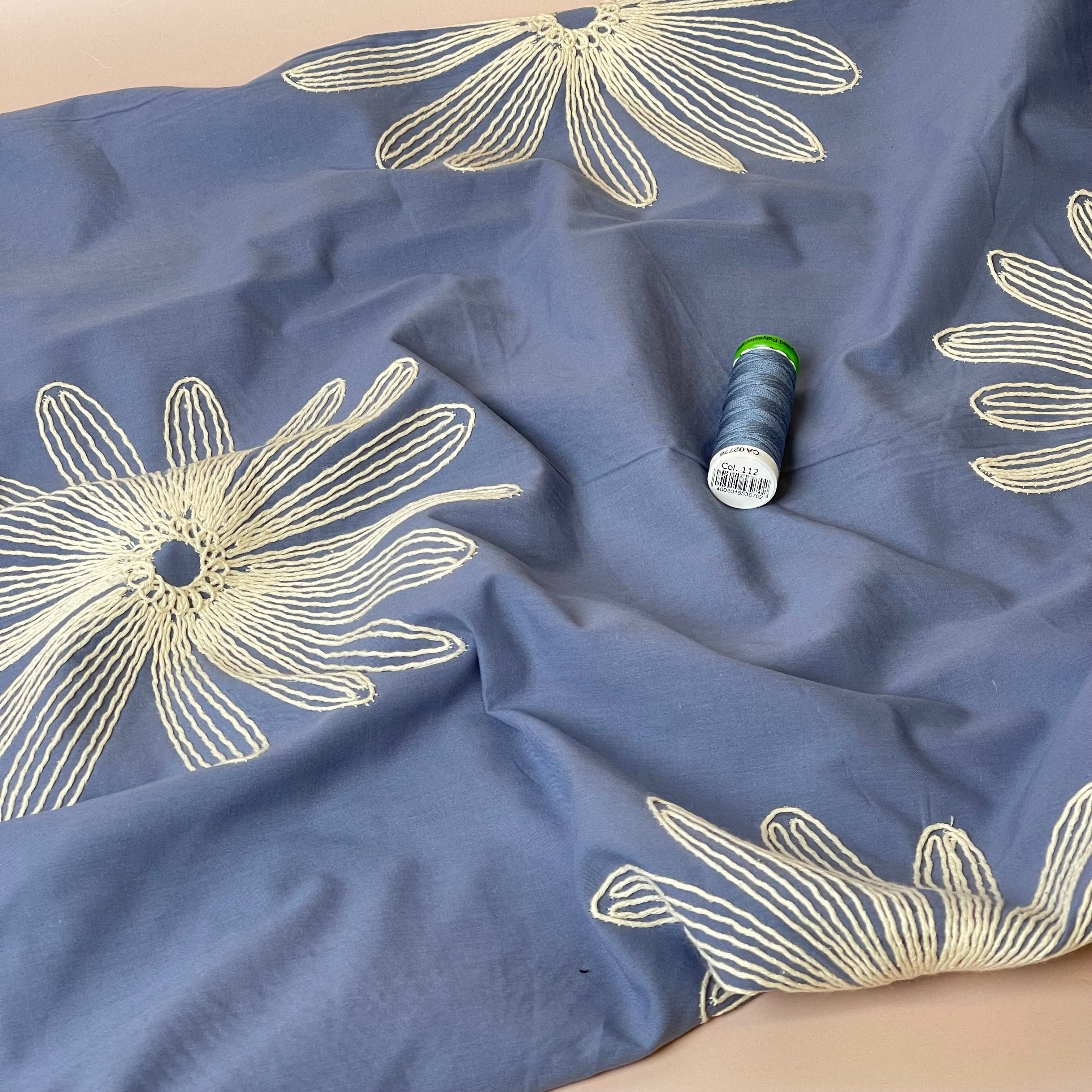 Embroidered Daisies on Blue Cotton Fabric