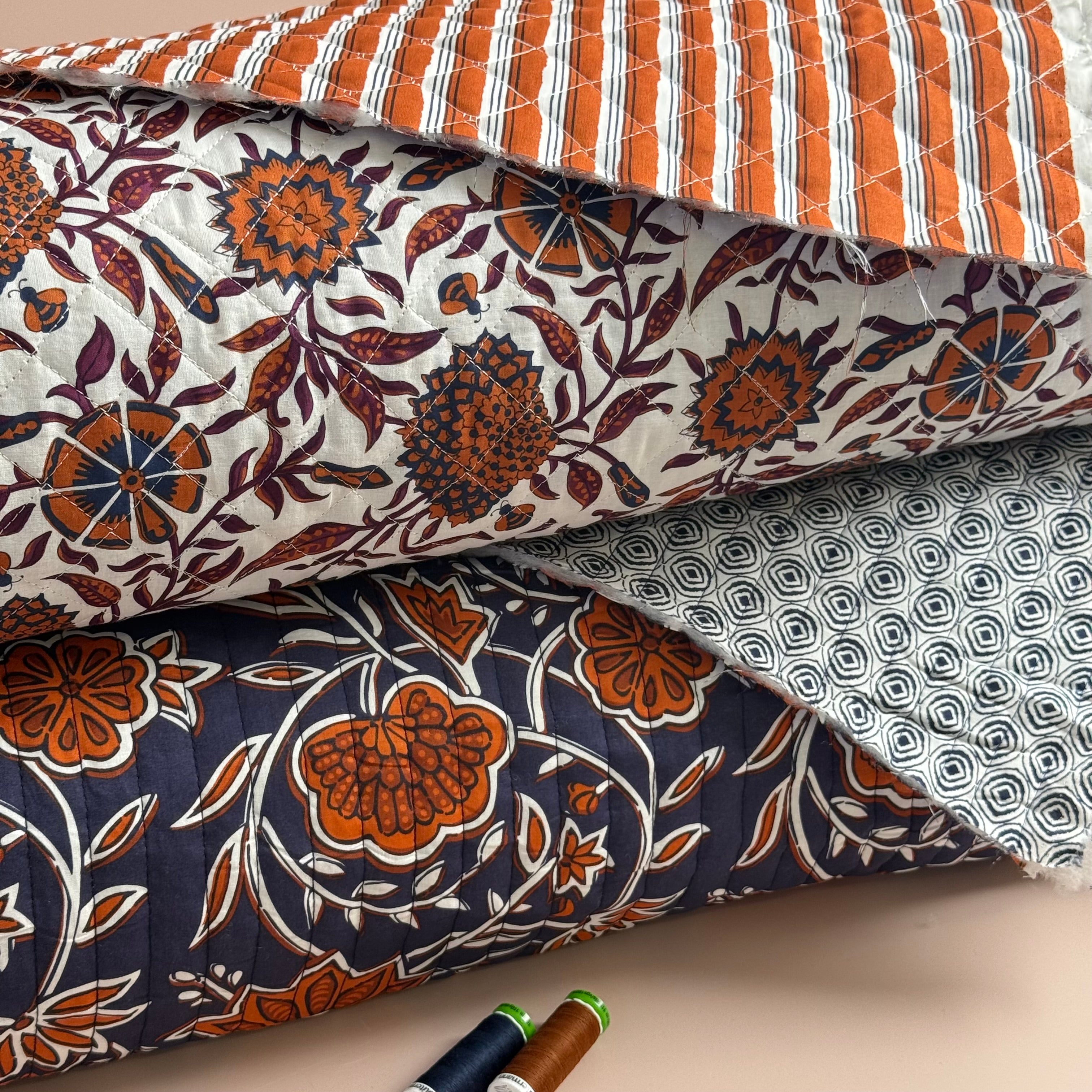 Ornamental Rust Flowers on Navy Quilted Cotton Fabric