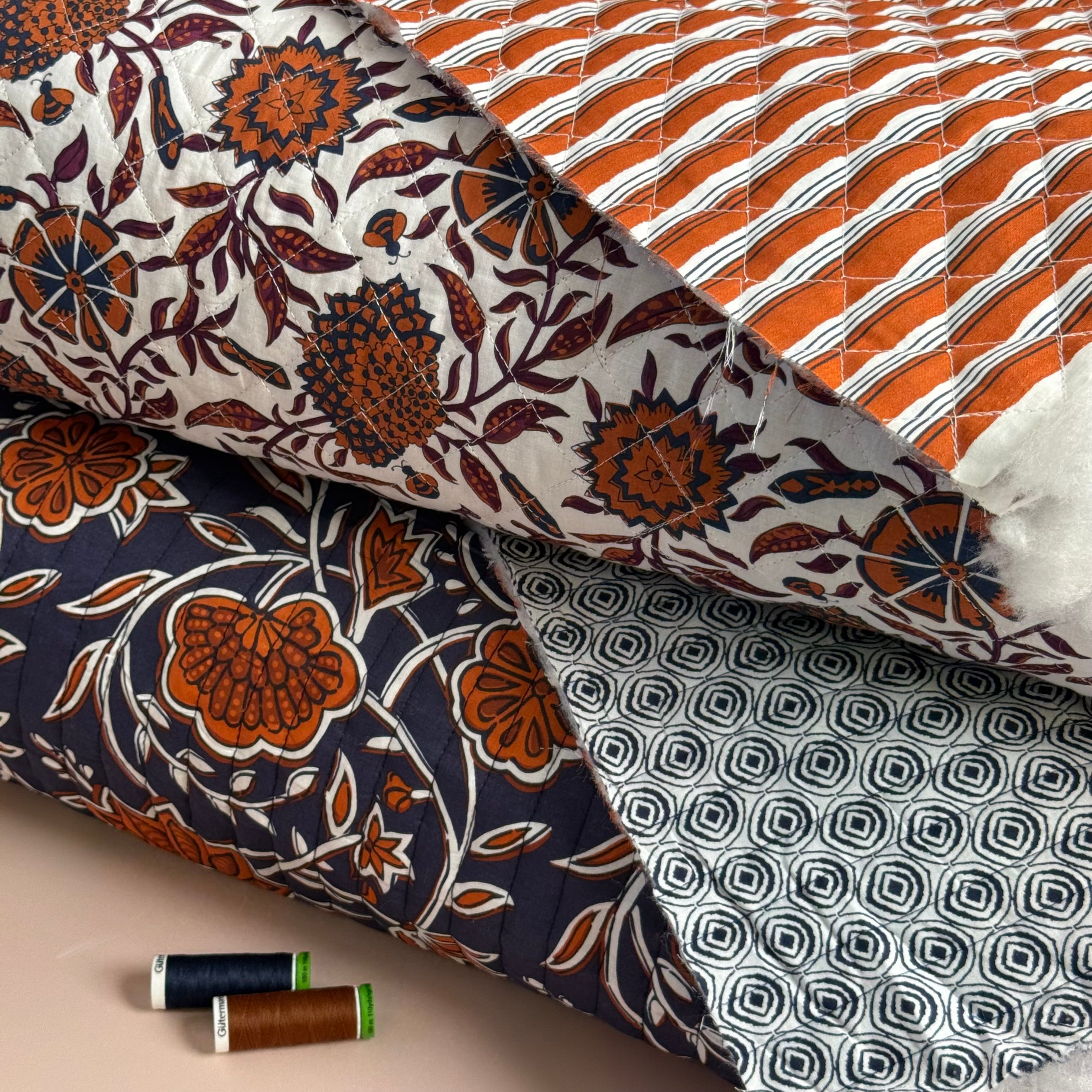 Ornamental Rust Flowers on Navy Quilted Cotton Fabric