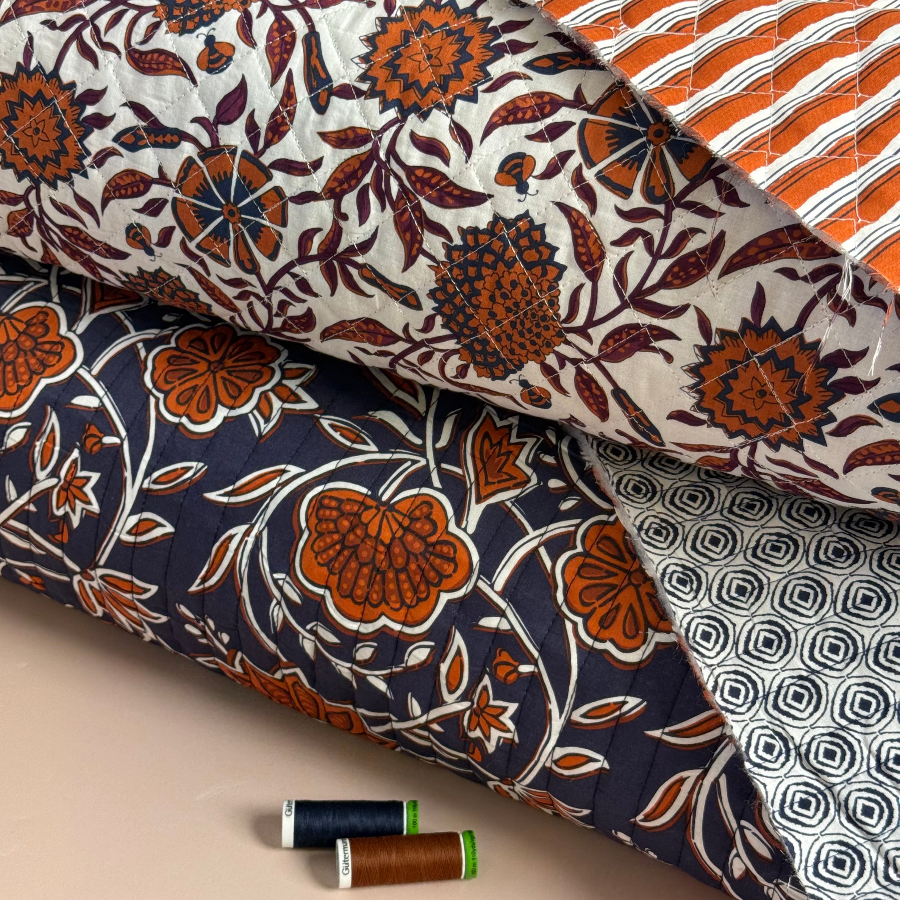 Ornamental Rust Flowers on Navy Quilted Cotton Fabric