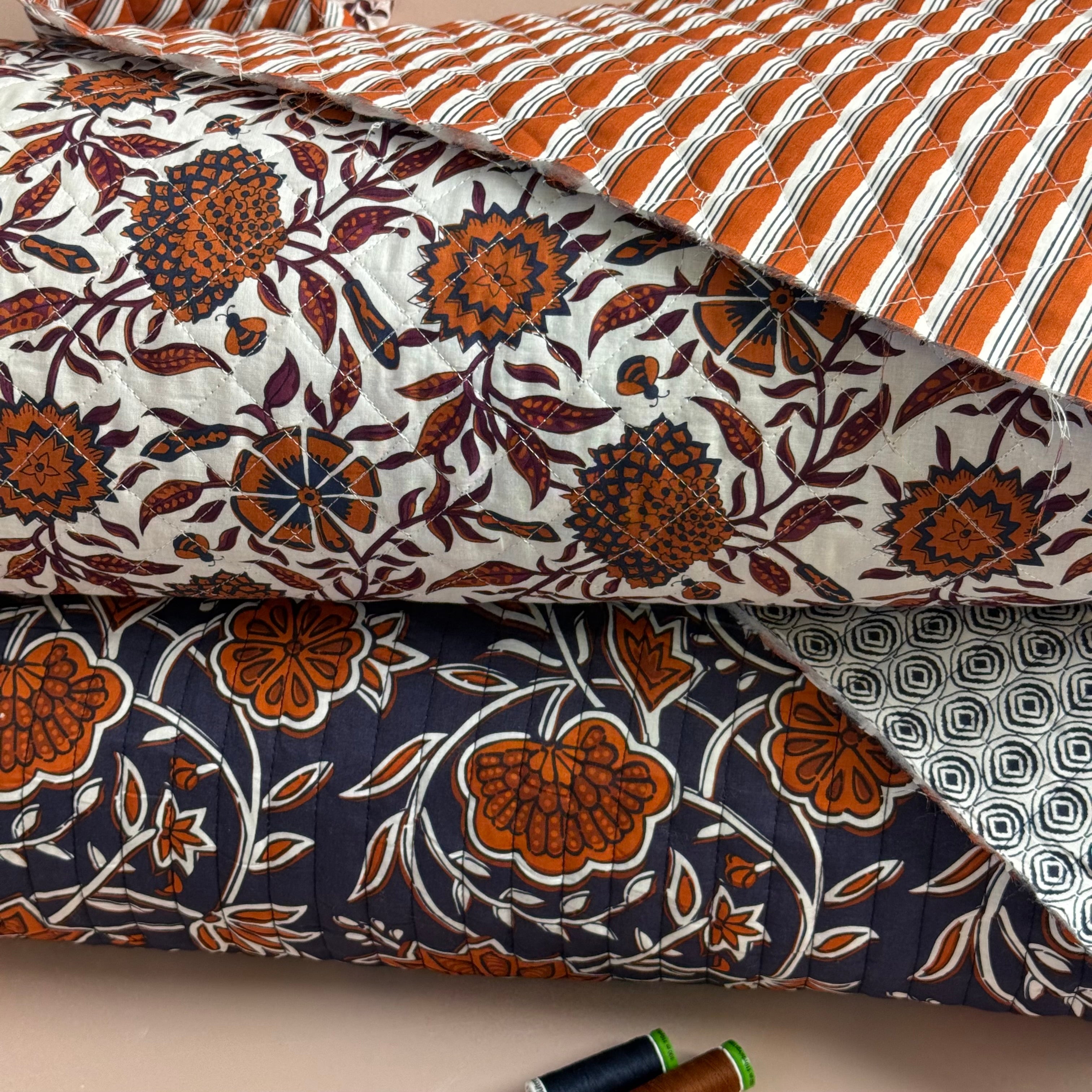 Ornamental Rust Flowers on Navy Quilted Cotton Fabric