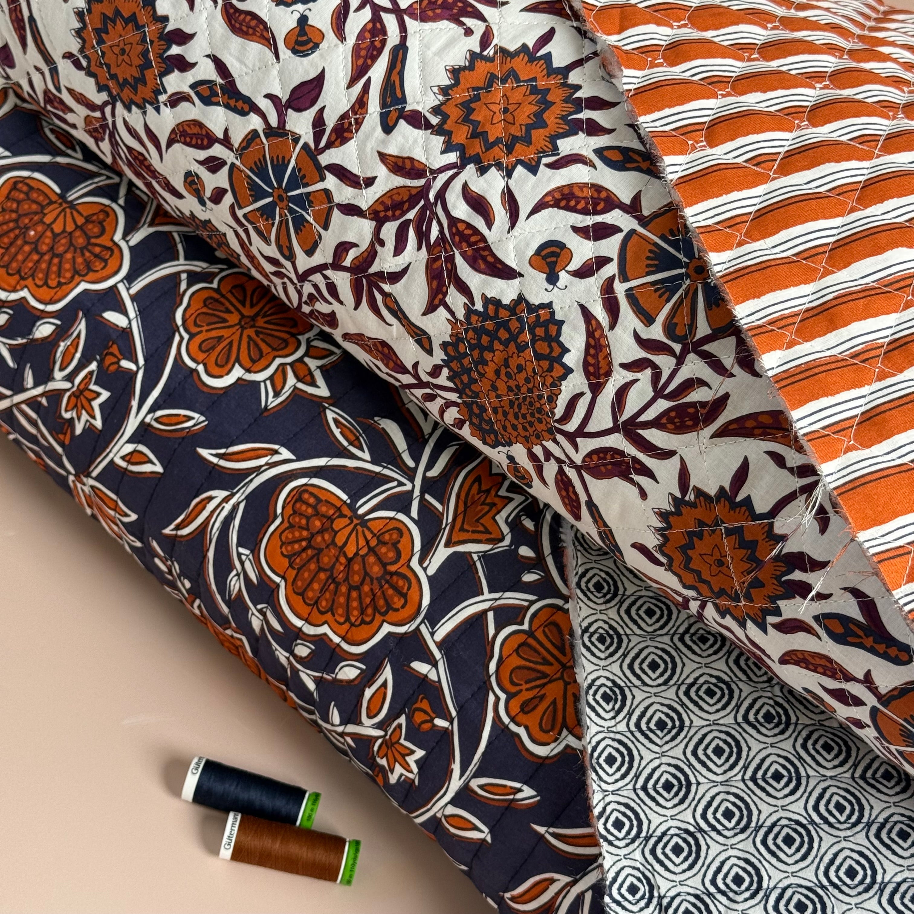 Ornamental Rust Flowers on Navy Quilted Cotton Fabric