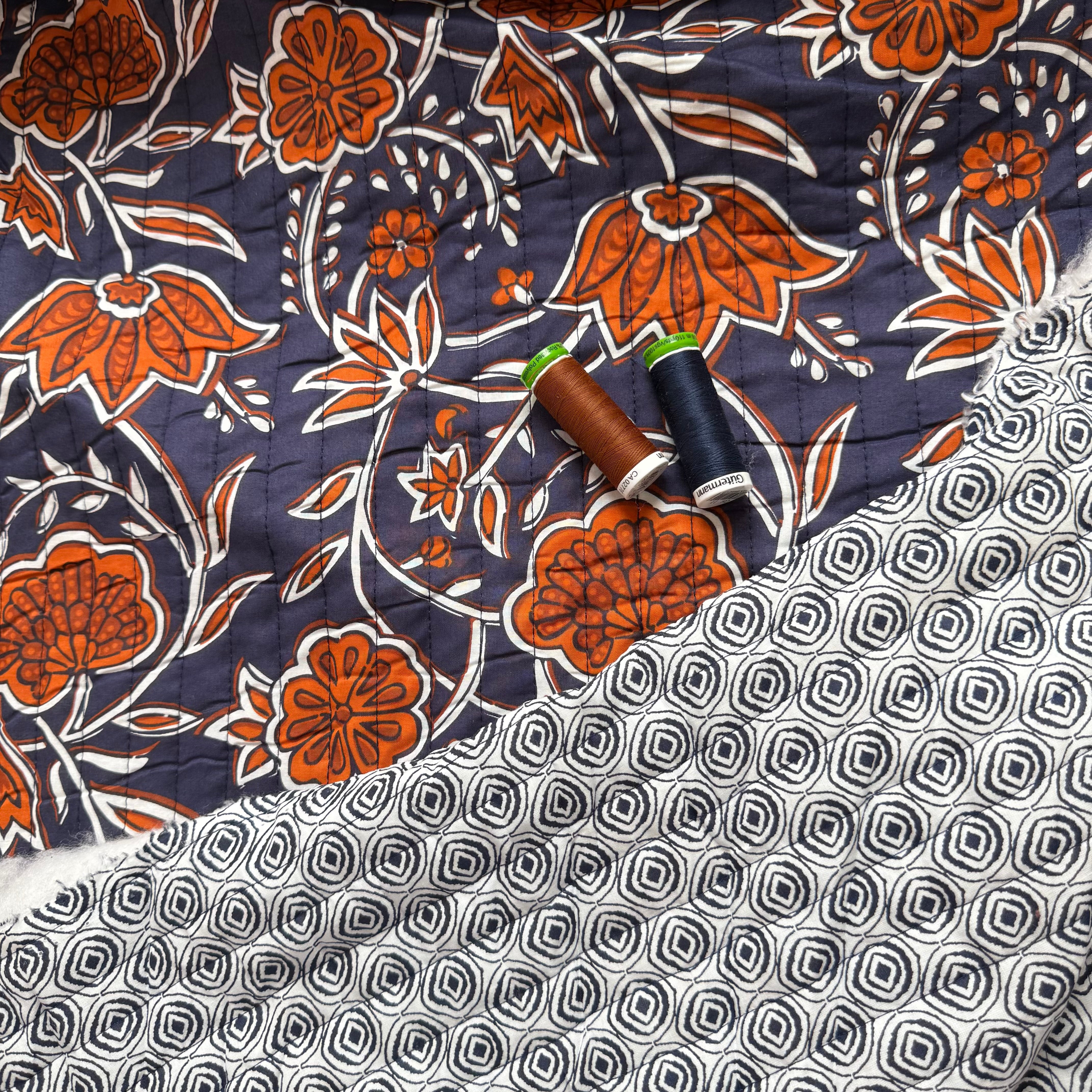 Ornamental Rust Flowers on Navy Quilted Cotton Fabric