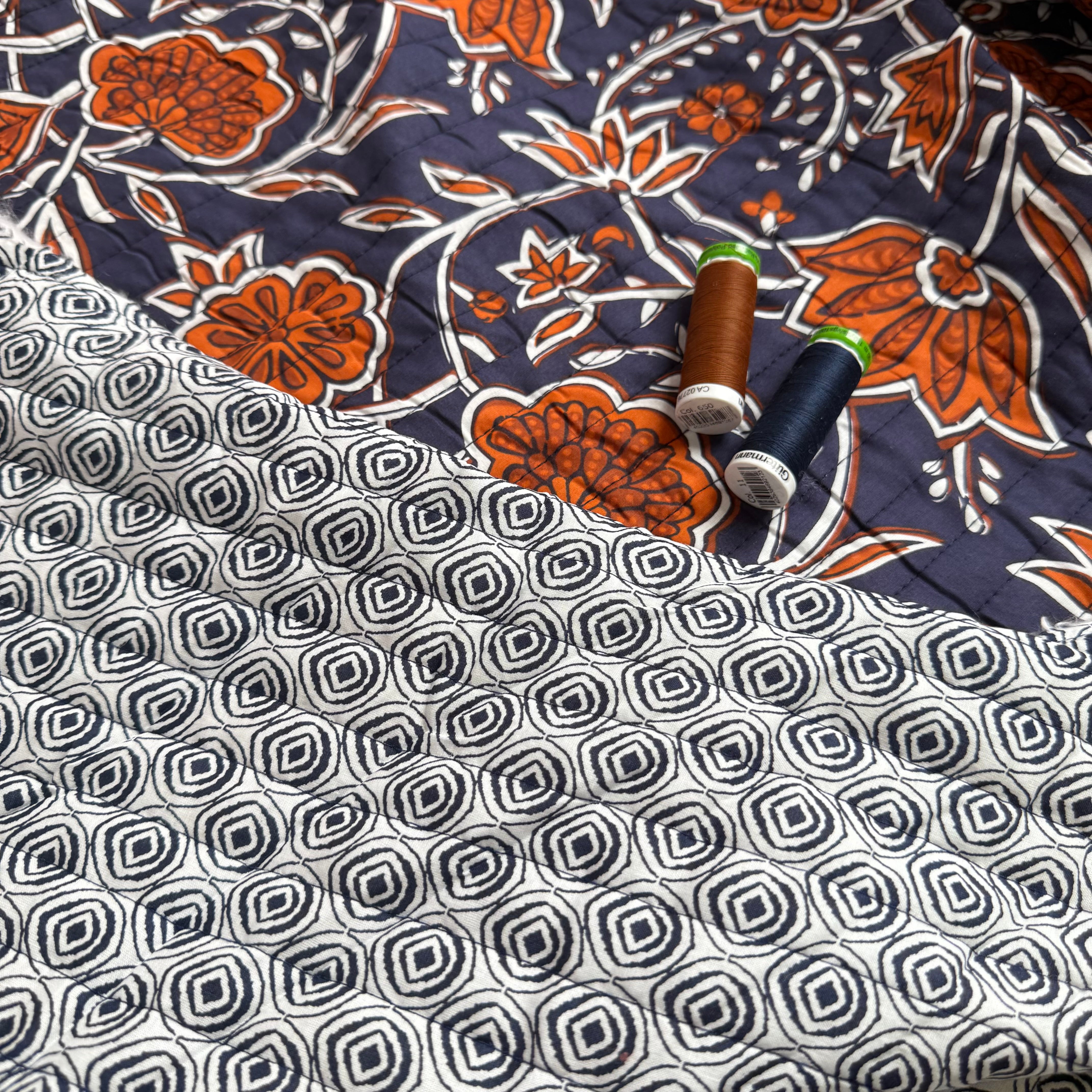 Ornamental Rust Flowers on Navy Quilted Cotton Fabric