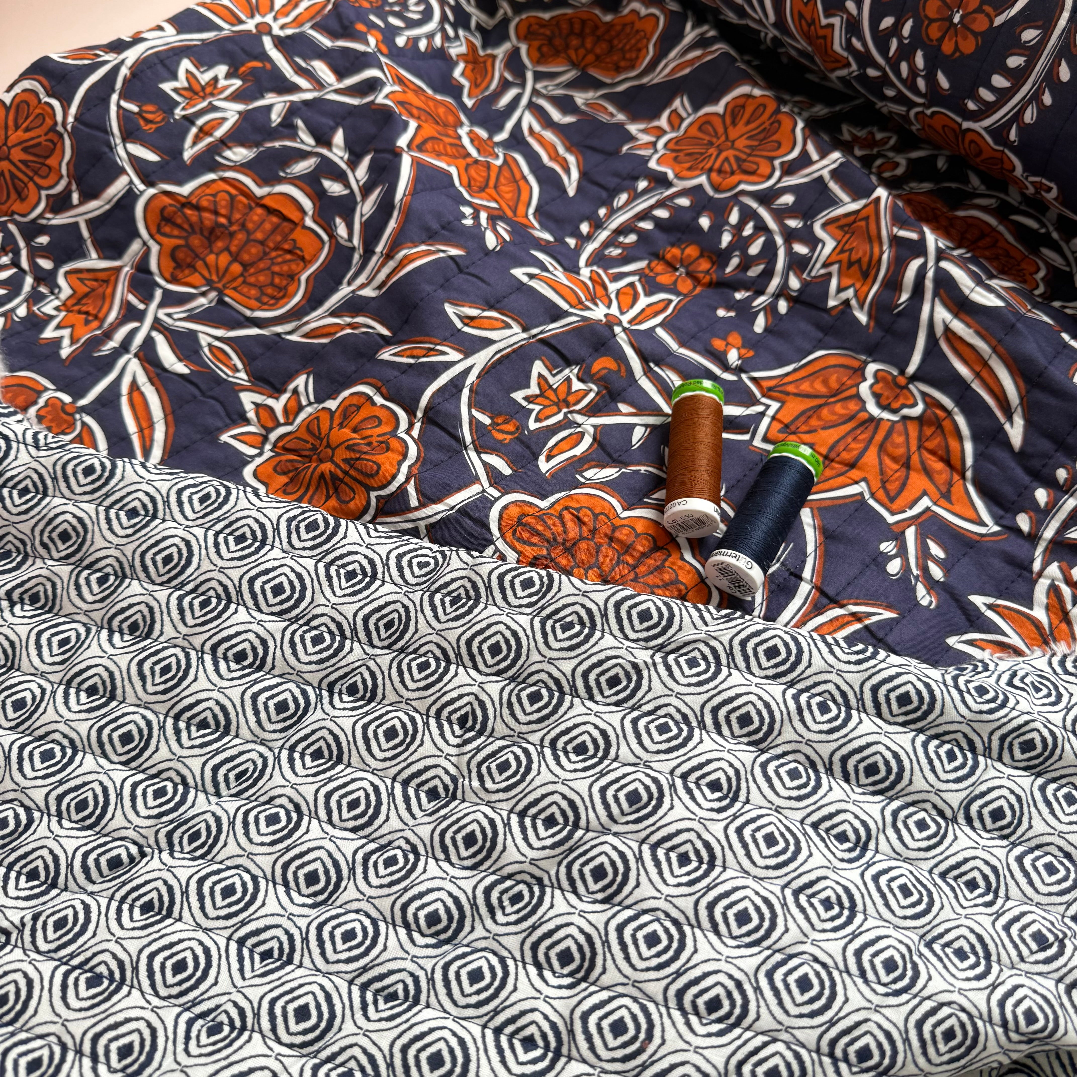 Ornamental Rust Flowers on Navy Quilted Cotton Fabric