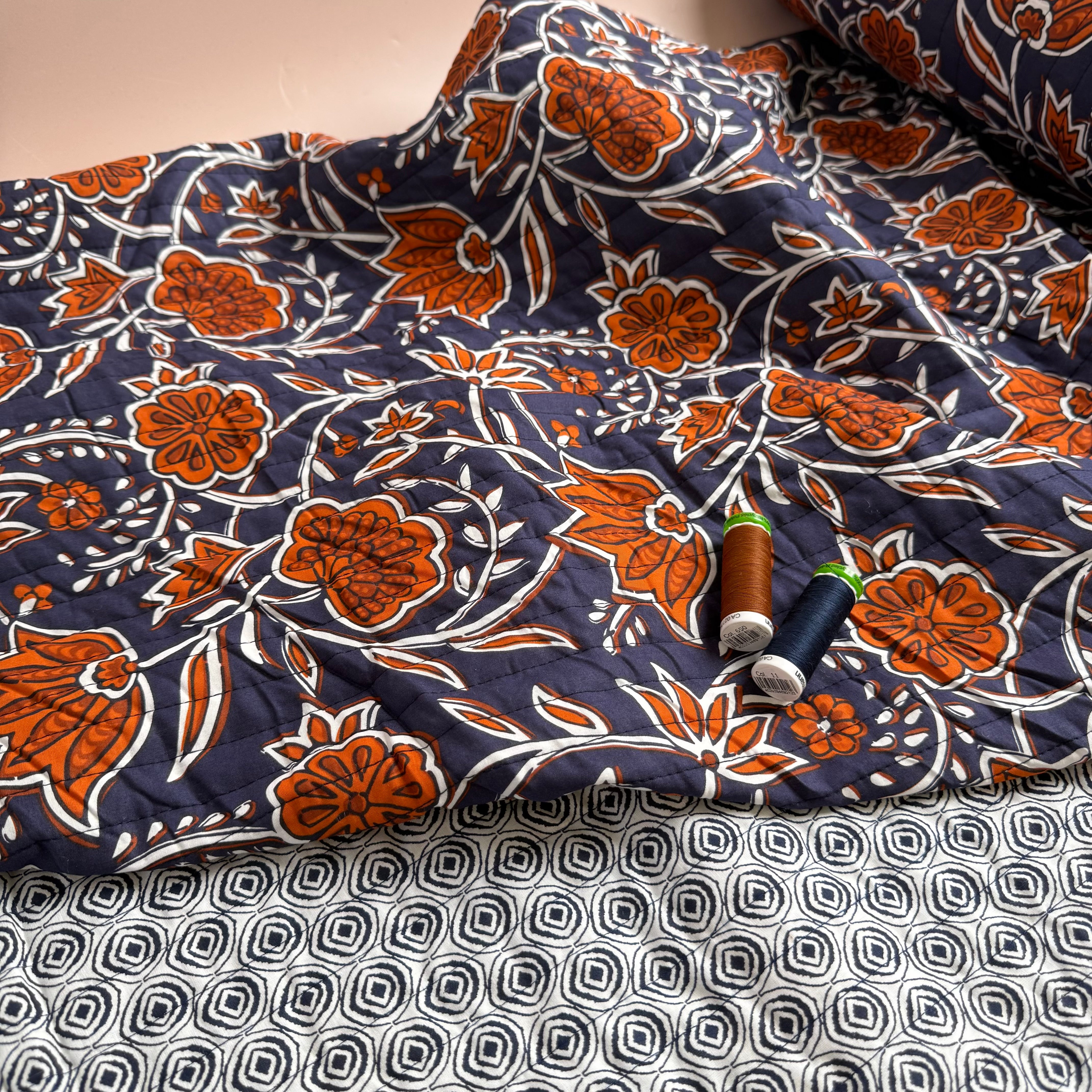 Ornamental Rust Flowers on Navy Quilted Cotton Fabric