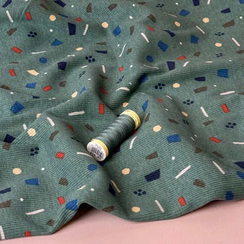 Small Shapes on Green Cotton Ribbed Jersey