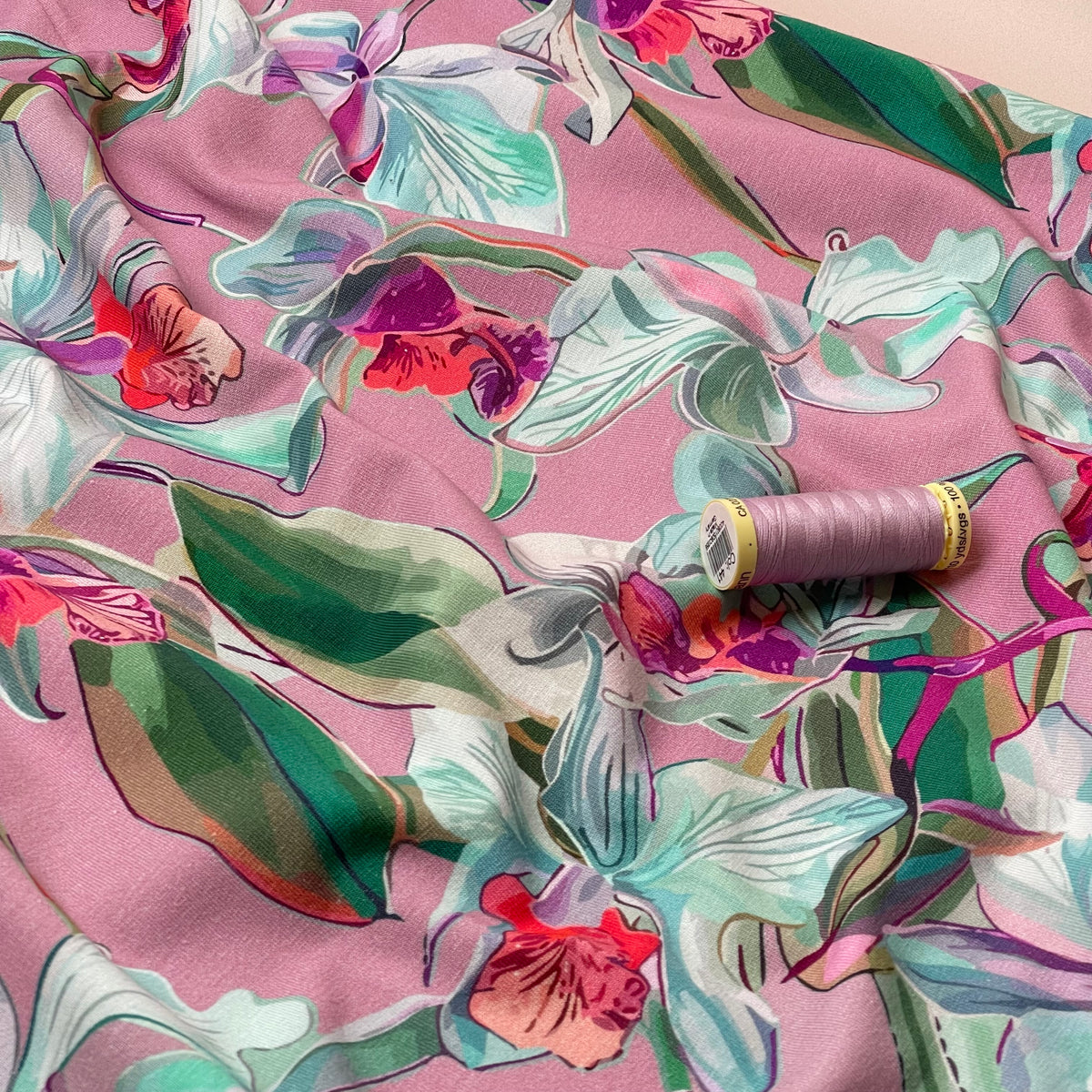 Lilies on Pink Cotton Jersey Fabric – Lamazi Fabrics