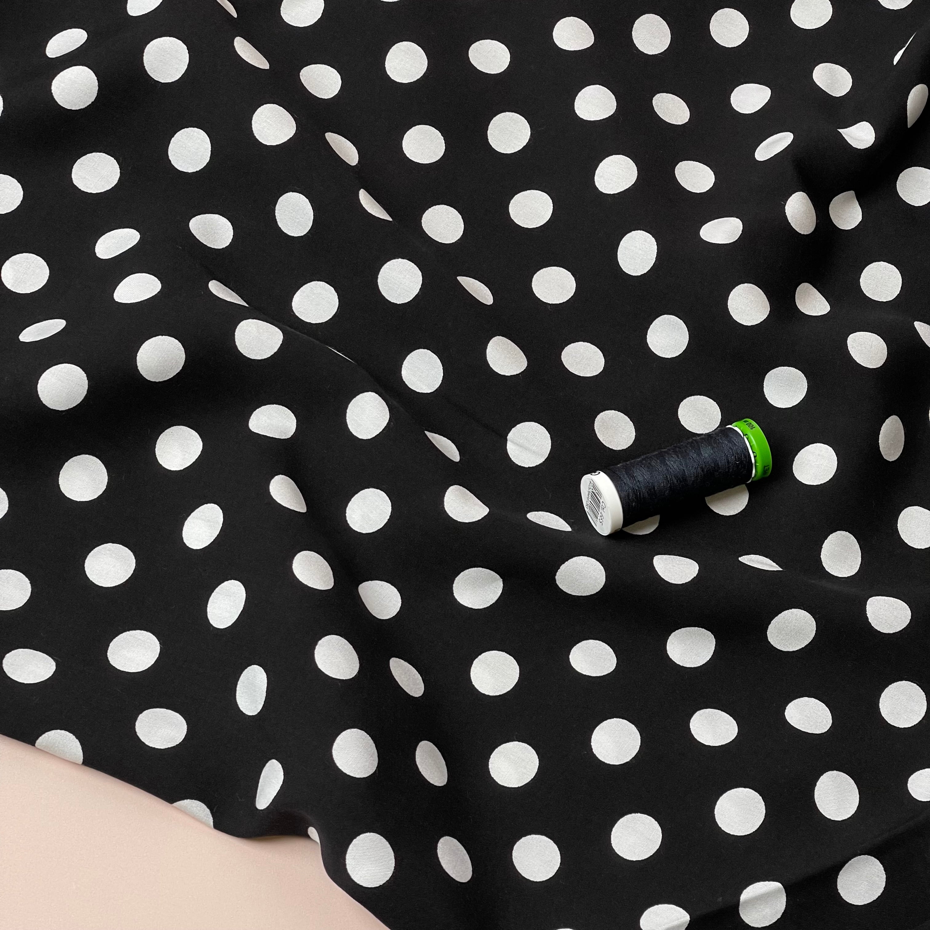 Polka Dots on Black Viscose Poplin Fabric