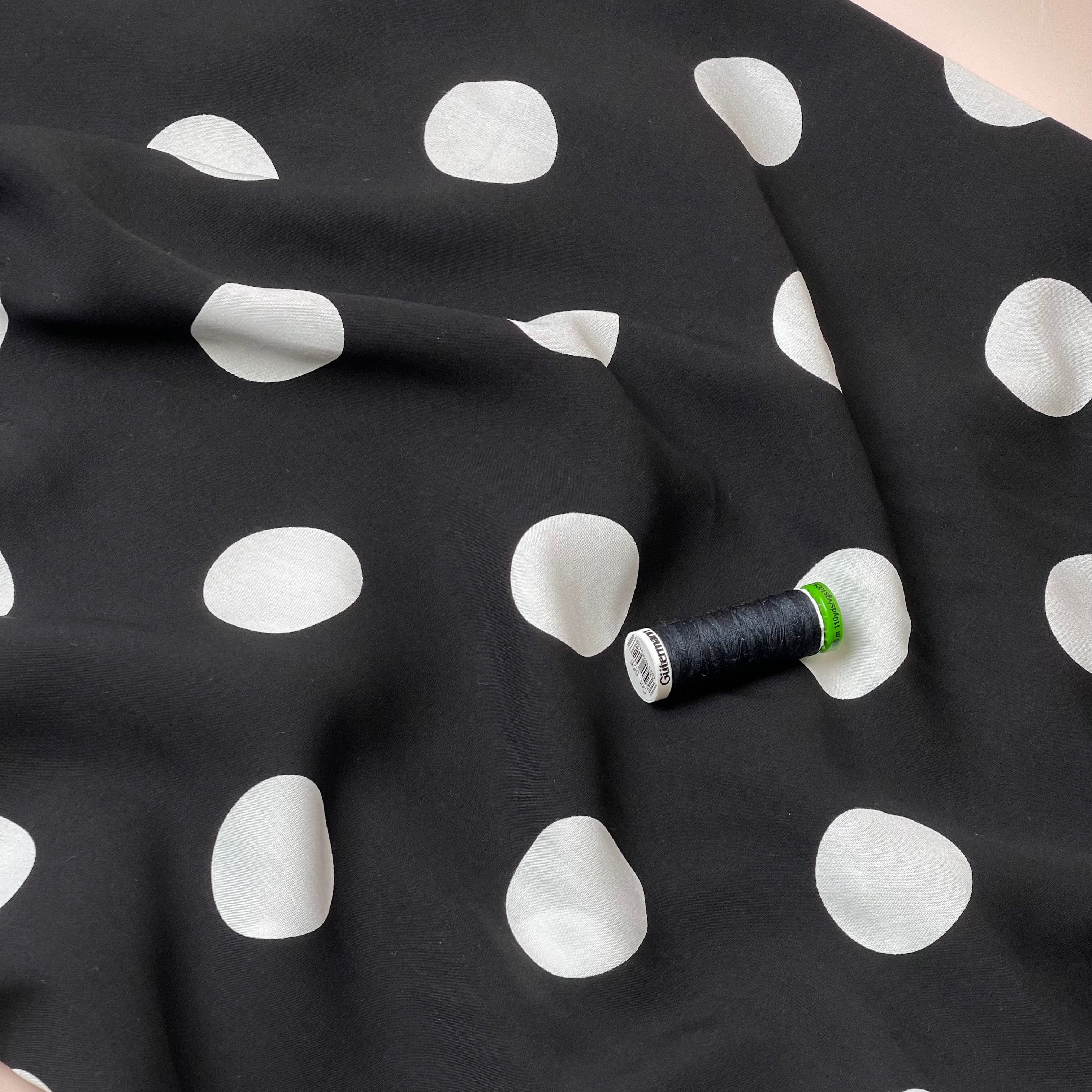 Large Polka Dots on Black Viscose Poplin Fabric