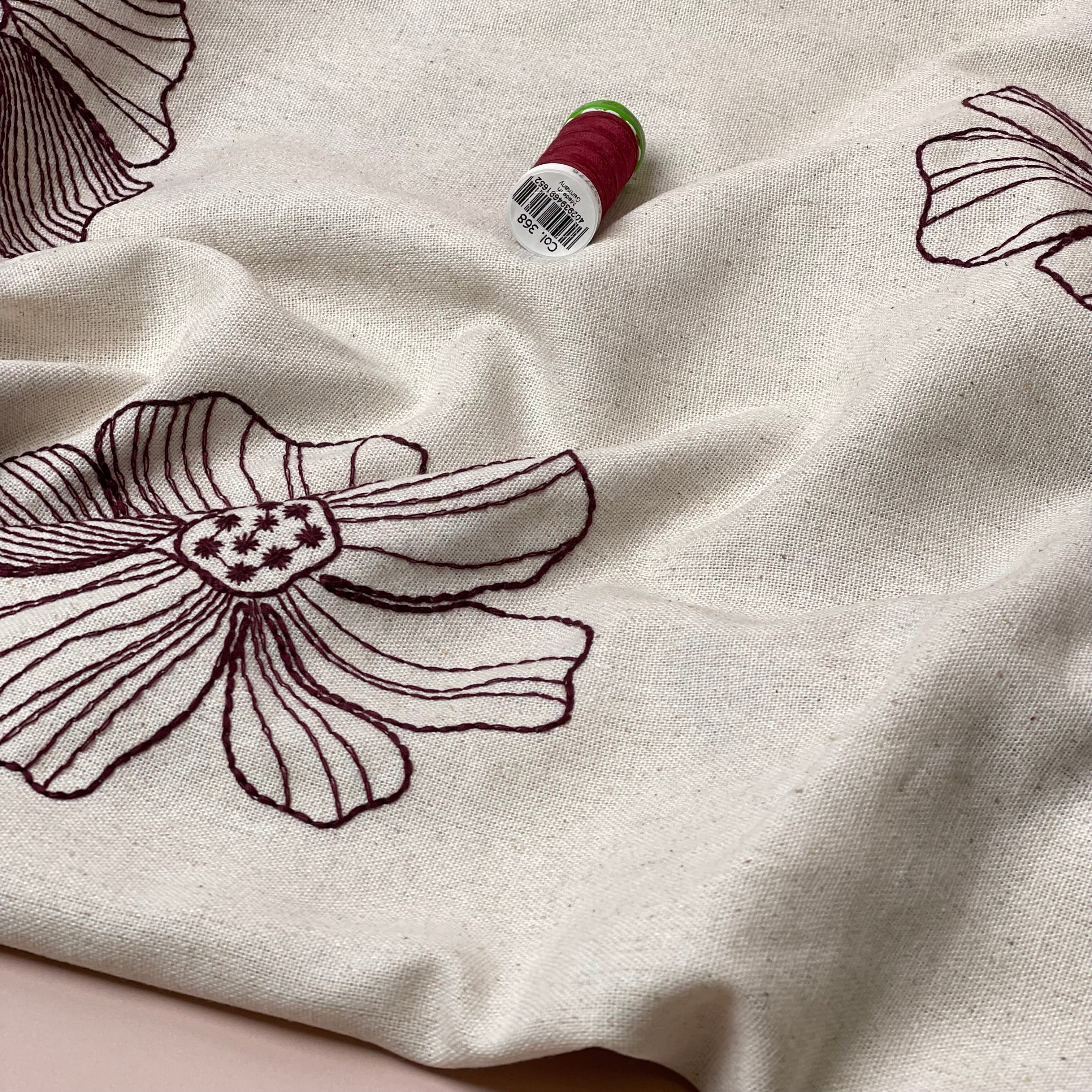 Embroidered Burgundy Flowers on Natural Linen Viscose Blend Fabric