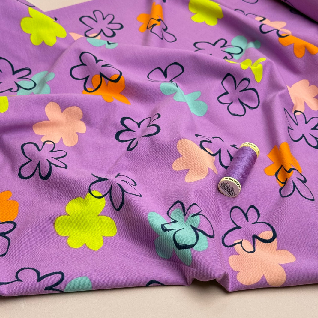 Flower Stamps on Lilac Cotton Jersey Fabric