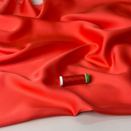 Coral Solid Viscose Sateen Fabric