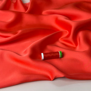 Coral Solid Viscose Sateen Fabric