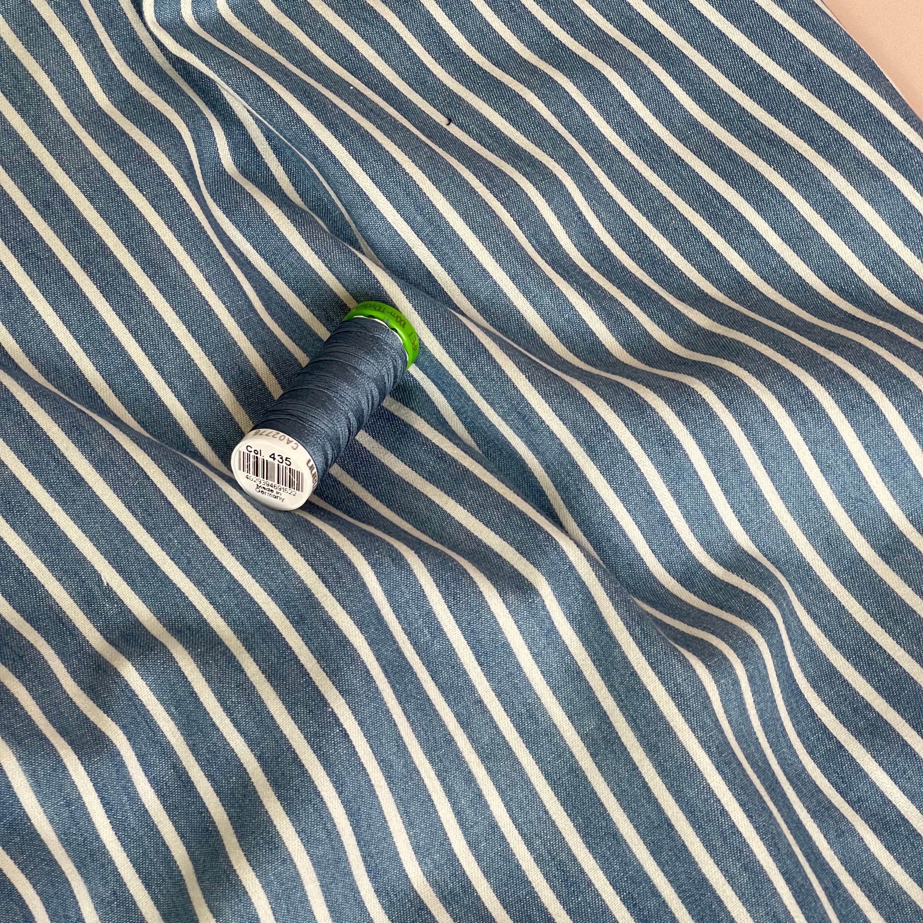 Off-White Stripes on Blue Denim Fabric