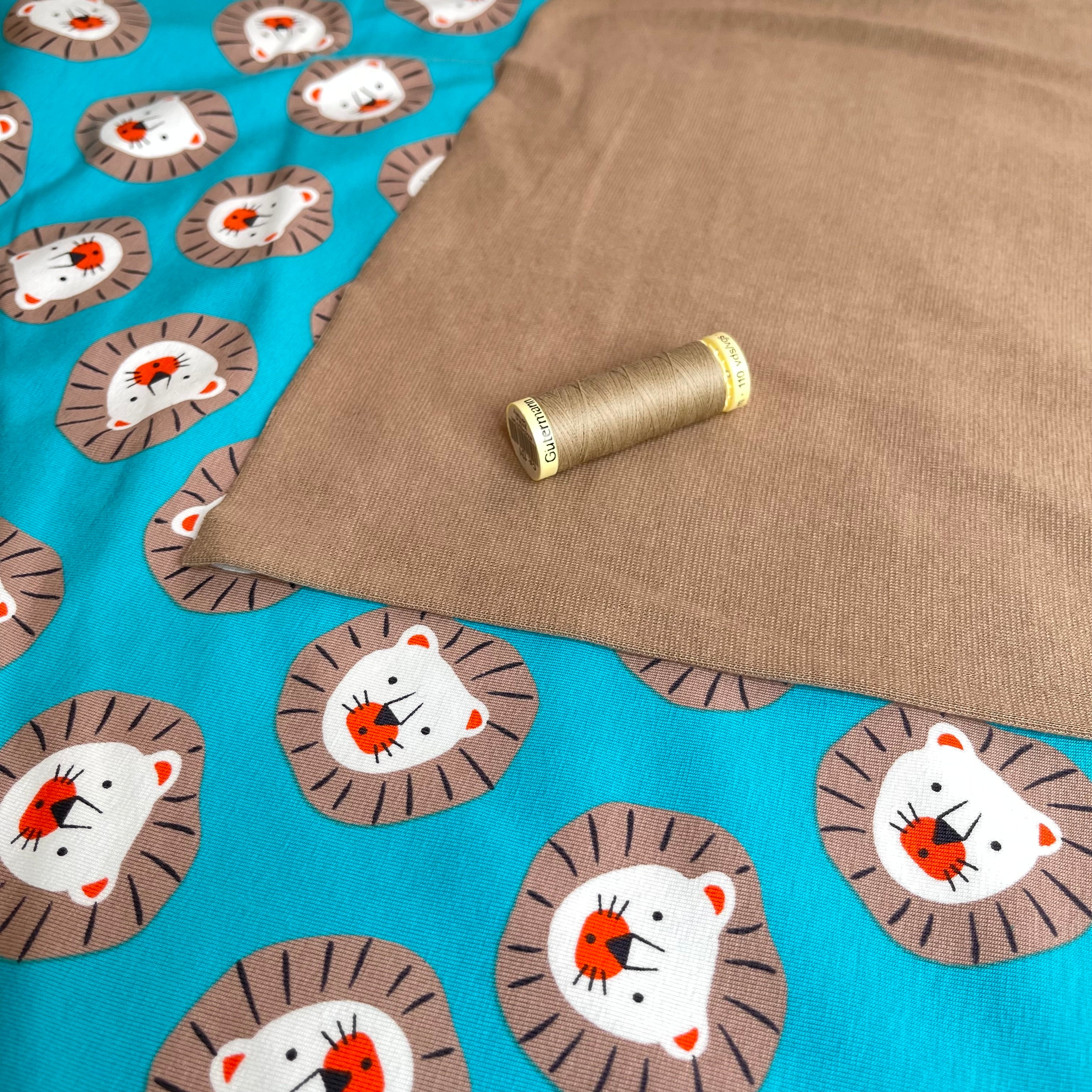 Cute Lions Turquoise Cotton Jersey Fabric