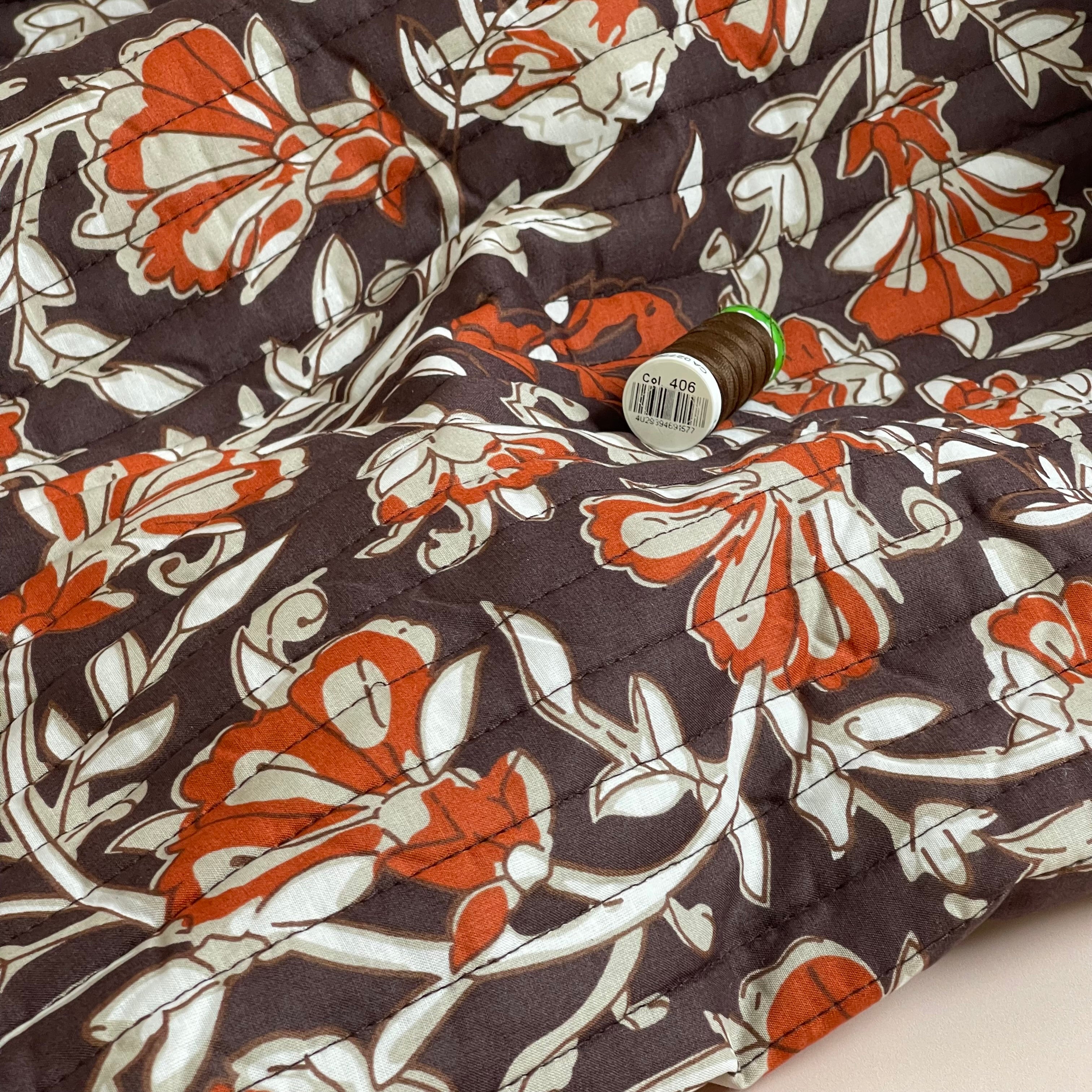 Rust Flowers on Beige Quilted Cotton Fabric