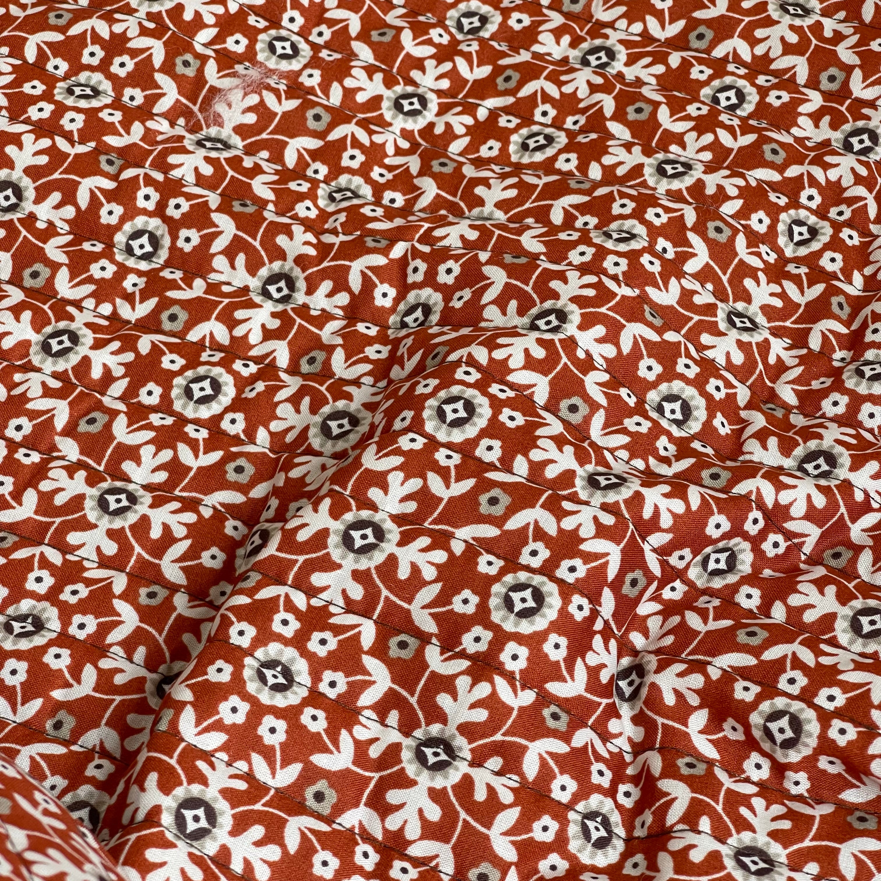 Rust Flowers on Beige Quilted Cotton Fabric