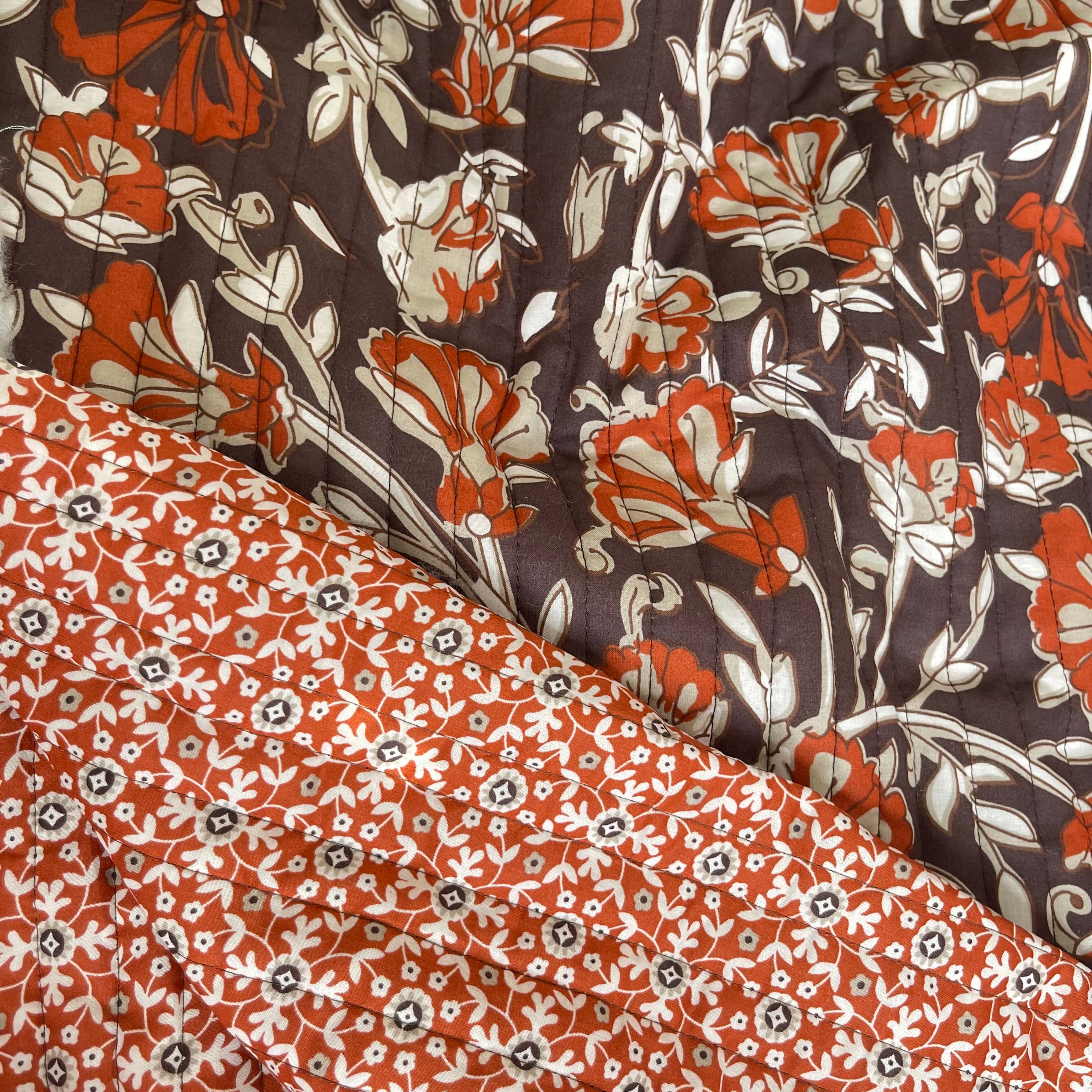 Rust Flowers on Beige Quilted Cotton Fabric