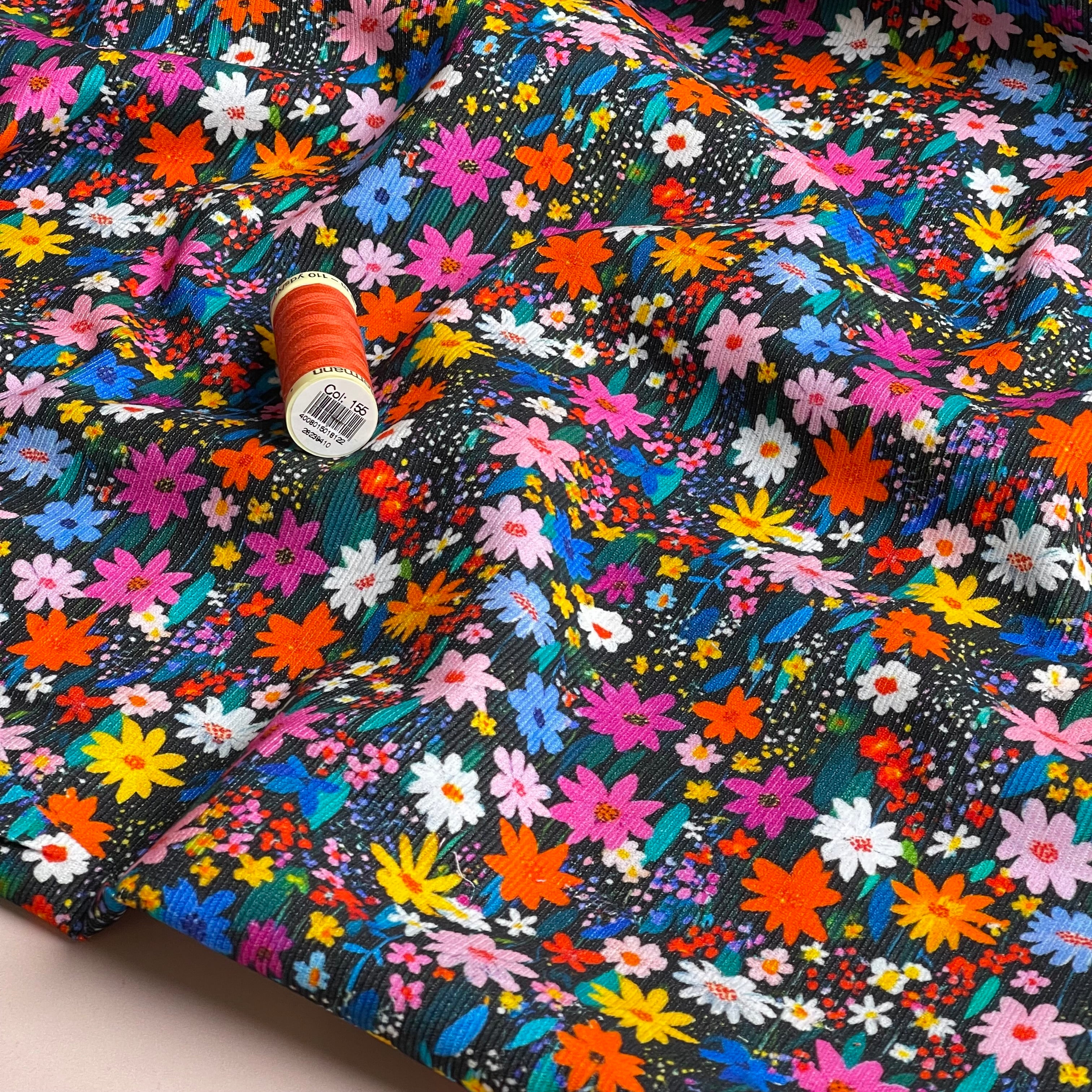 Ditsy Meadow on Black Cotton Needlecord