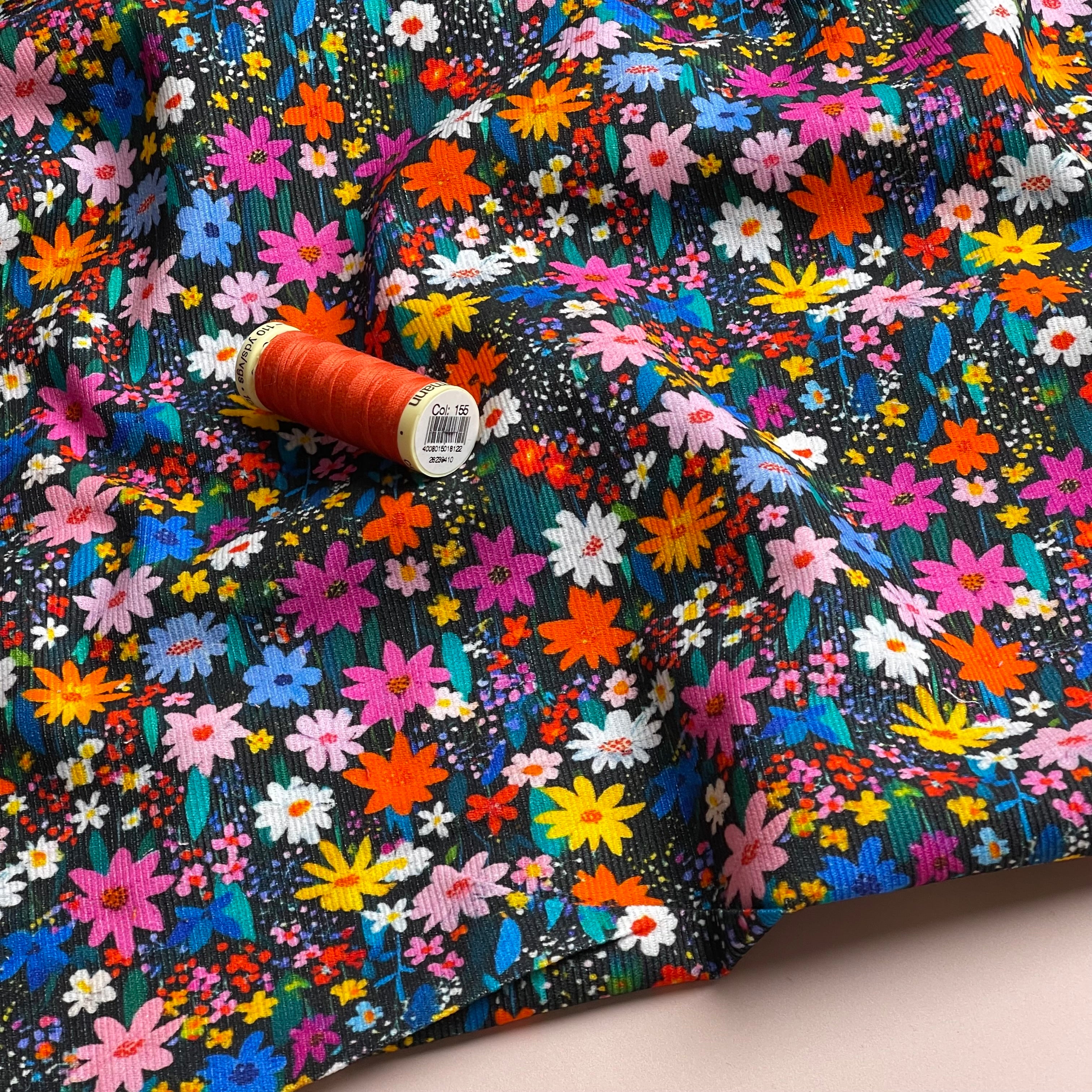Ditsy Meadow on Black Cotton Needlecord