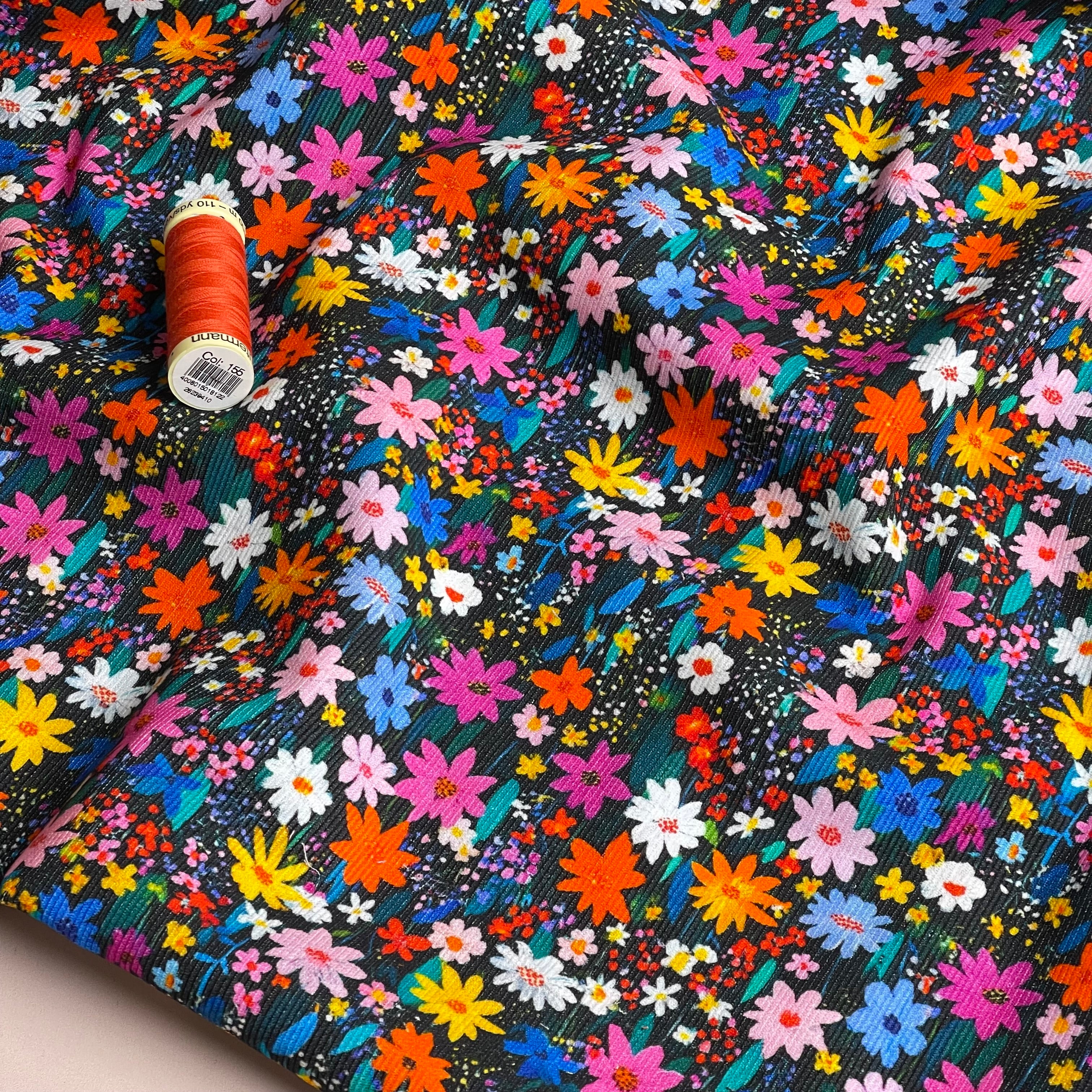 Ditsy Meadow on Black Cotton Needlecord